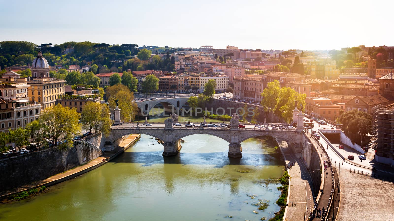 Skyline with bridge Ponte Vittorio Emanuele II and classic architecture in Rome, Vatican City scenery over Tiber river.