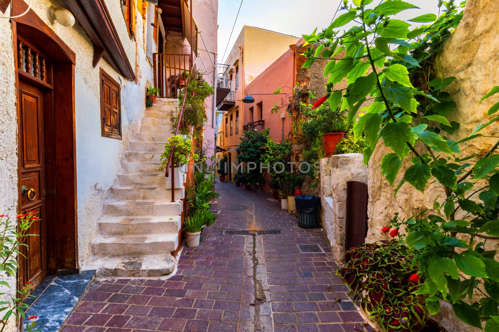 Charming streets of Greek islands, Crete. Street in the old town of Chania, Crete, Greece. Beautiful street in Chania, Crete island, Greece. Summer landscape. Travel and vacation.
