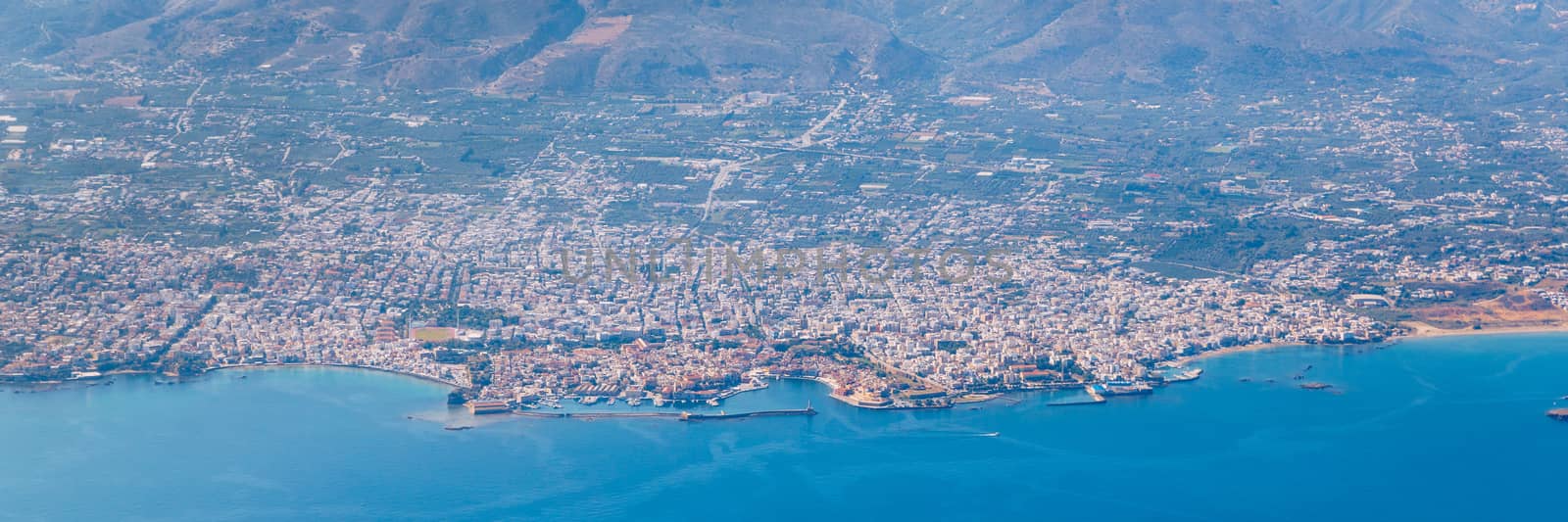 Crete island. Beautiful view of the Crete island Greece from the plane. Holiday, relaxation, sea. Crete view from plane. Greek Island. Seaside of Crete island, aerial view, Greece.