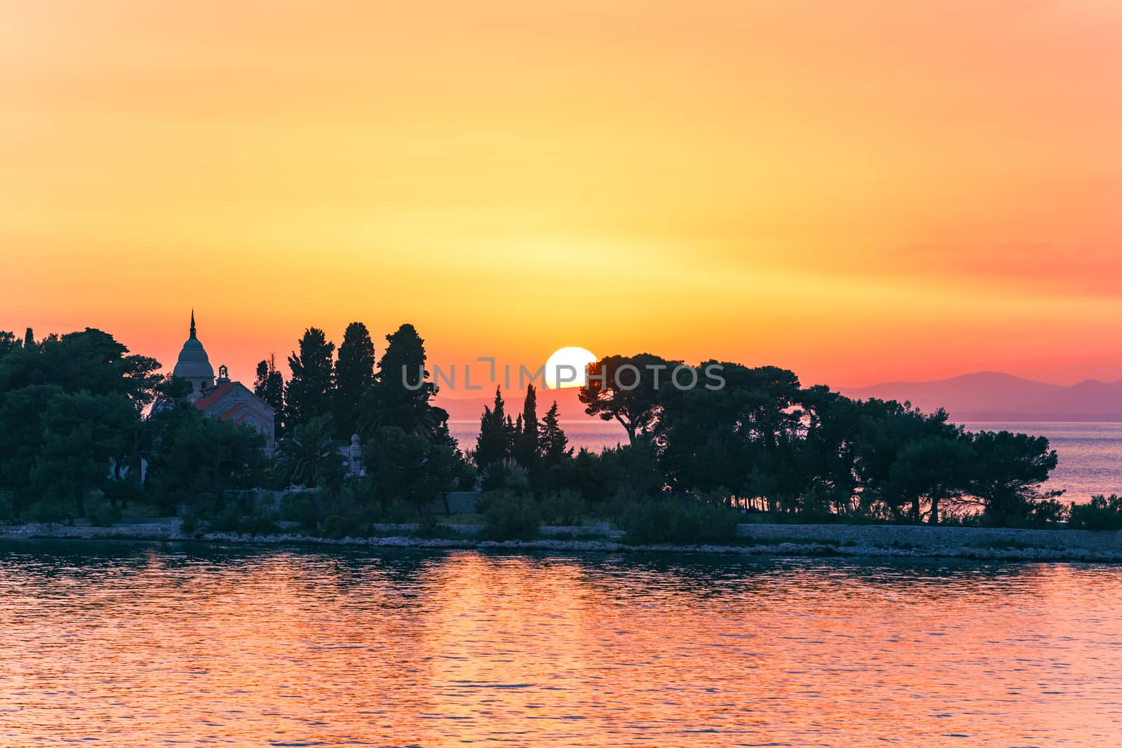 Sunset or sunrise sky above the sea. Nature, weather, atmosphere, travel theme. Sunrise or sunset over the sea. Panorama