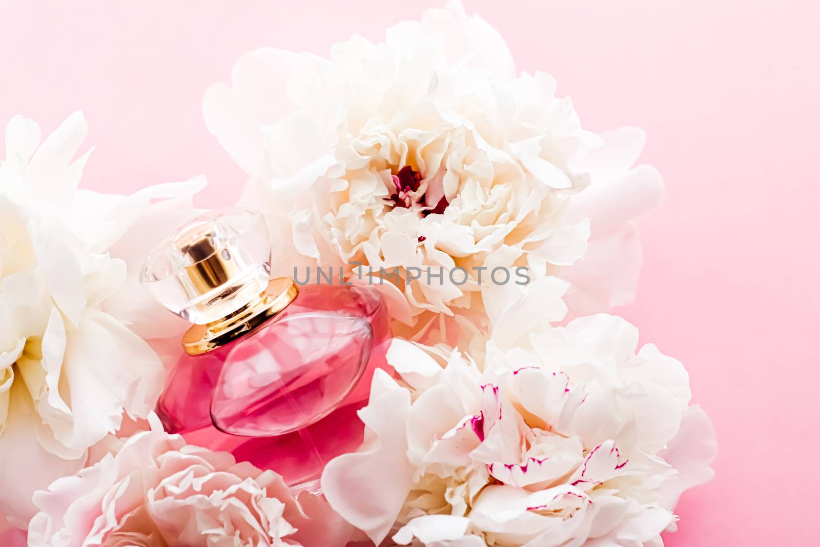 Luxurious fragrance bottle as chic perfume product on background of peony flowers, parfum ad and beauty branding by Anneleven
