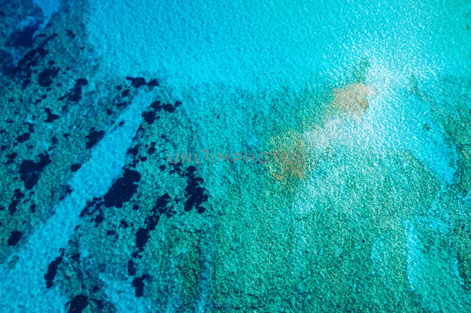 Aerial shot of beautiful turquoise beach Falasarna (Falassarna) in Crete, Greece. View of famous paradise sandy deep turquoise beach of Falasarna (Falassarna) in North West, Crete island, Greece.