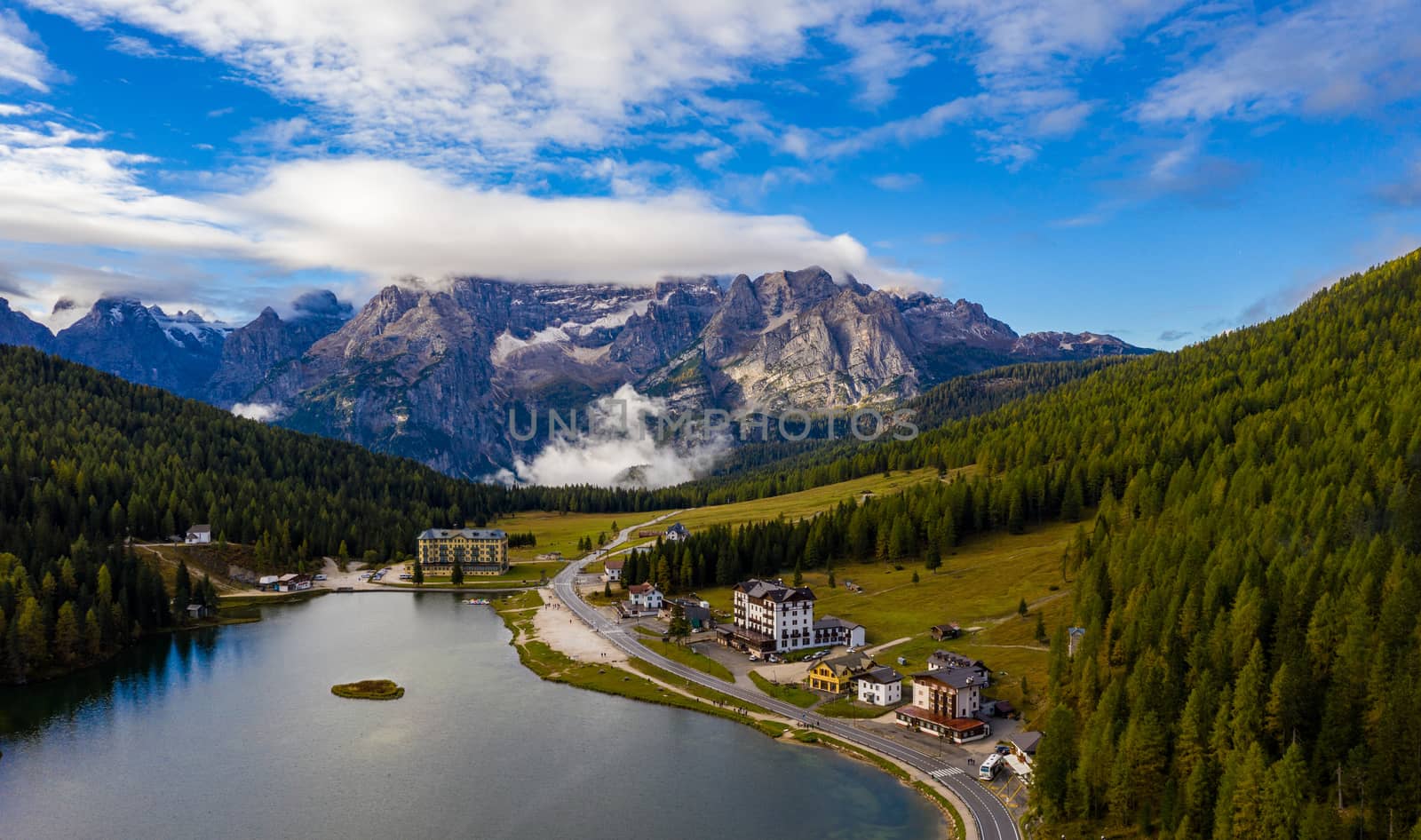 Lake Misurina or Lago di Misurina Italy. Misurina Lake with perfect sky reflection in calm water. Stunning view on the majestic Dolomites Alp Mountains, Italy, National Park Tre Cime di Lavaredo.