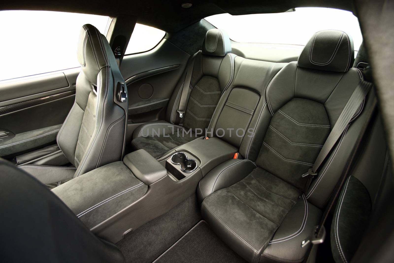 Rear leather seats in a large luxury sports car