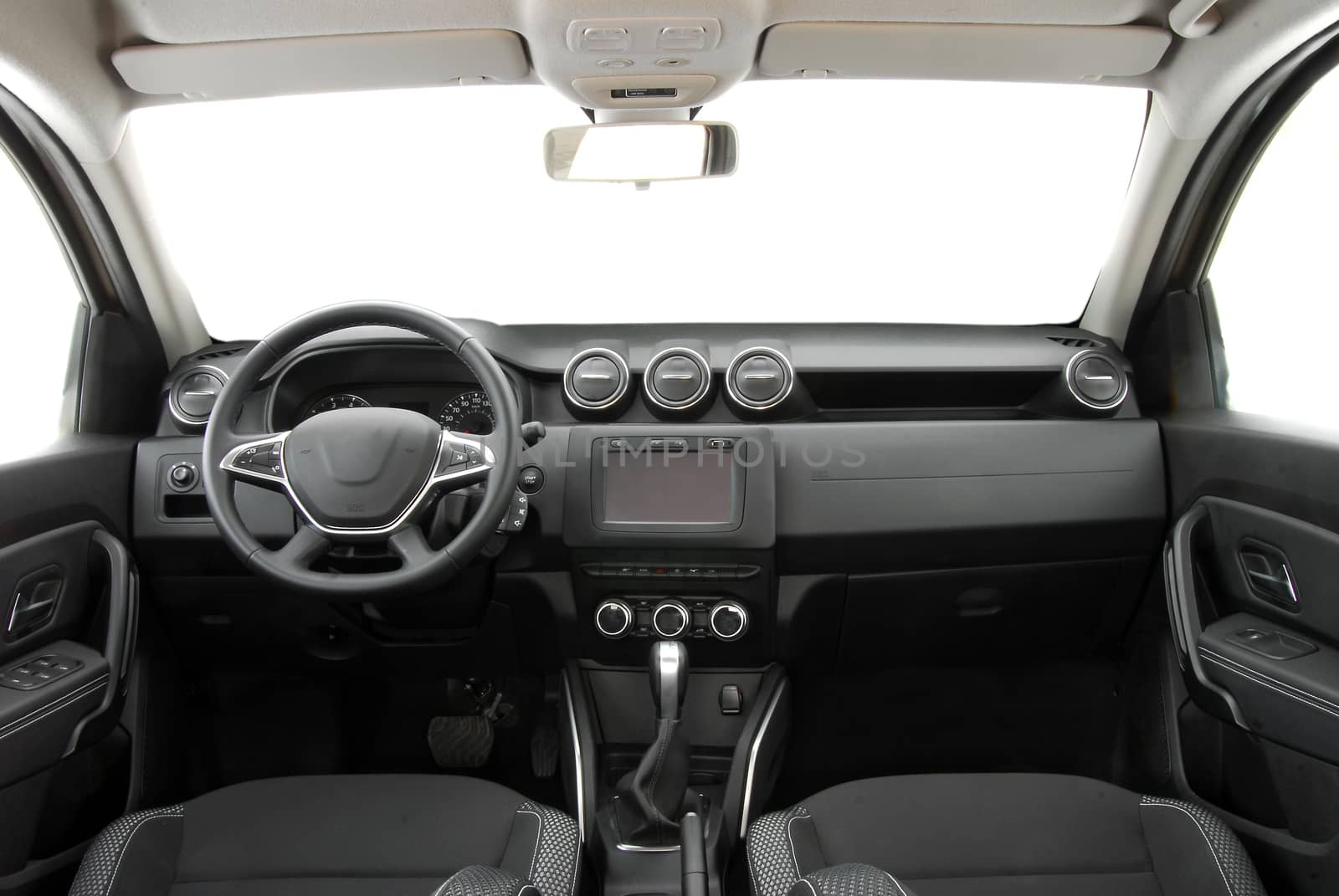 studio shot passenger car interior, front view