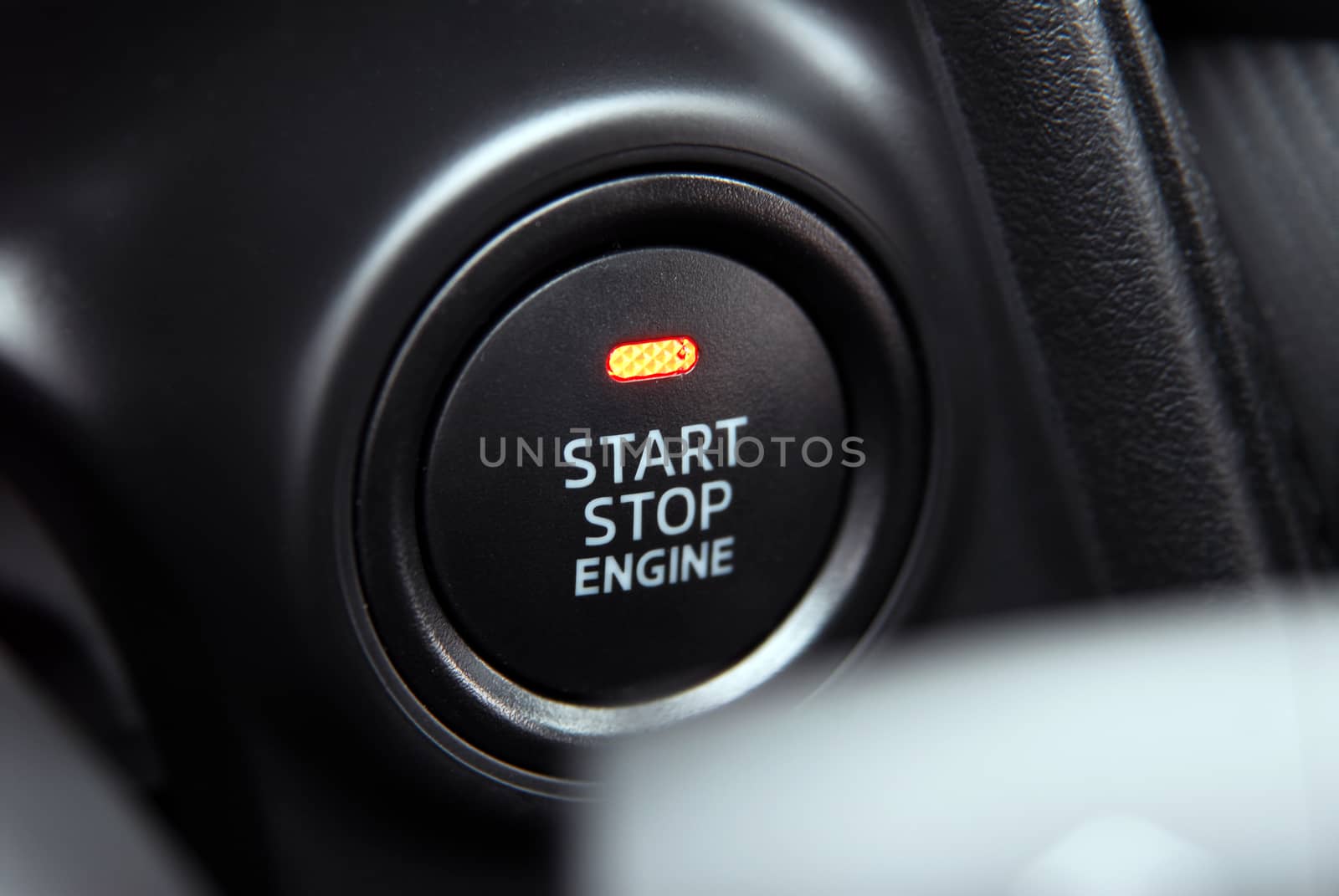 Start stop engine button on a modern car dashboard