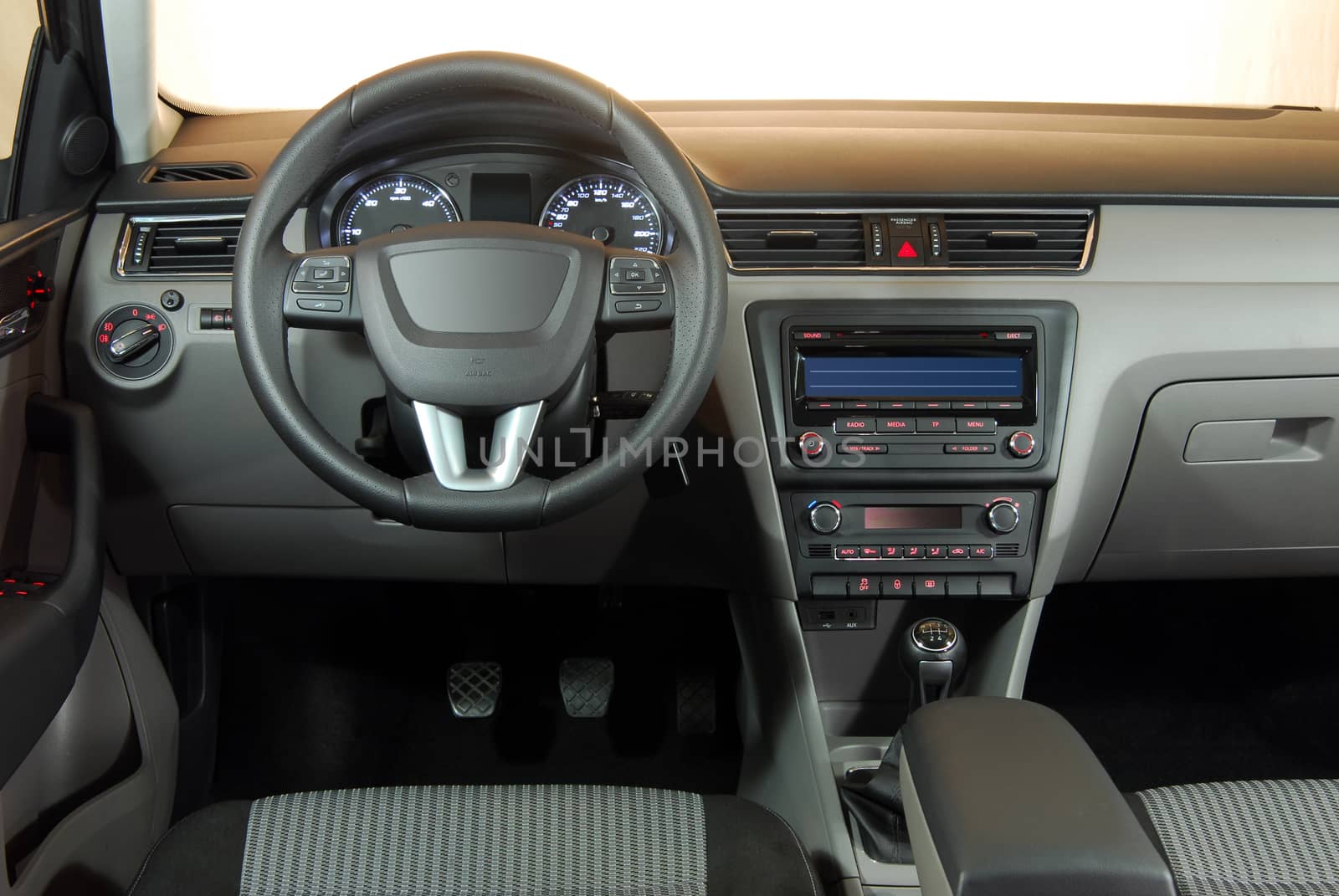 studio shot passenger car interior, front view