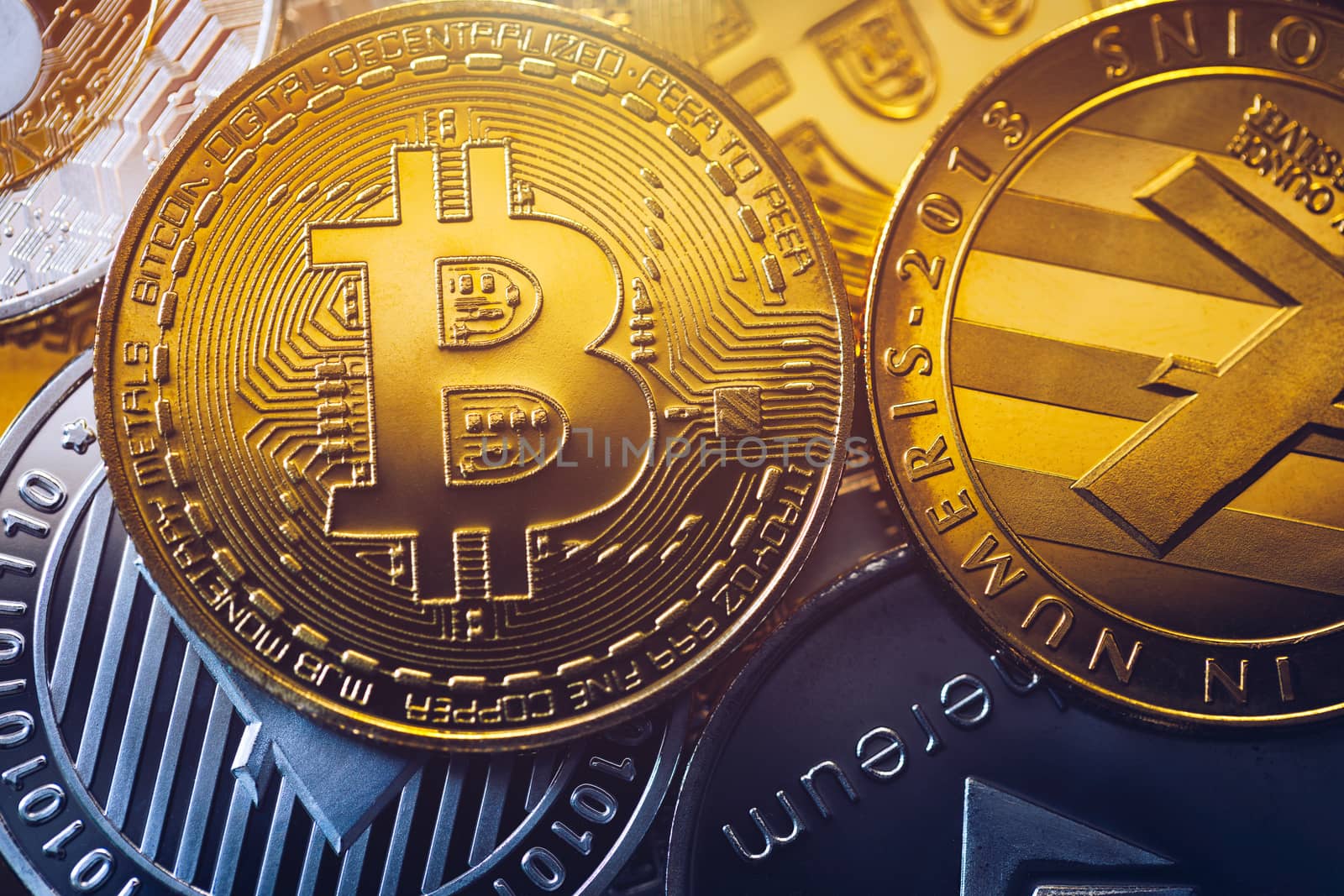 Set of cryptocurrencies with Bitcoin, Etherium, Ripple, Litecoin. Cryptocurrencys new digital money. Bitcoin on the front as the leader. Bitcoin as most important cryptocurrency.