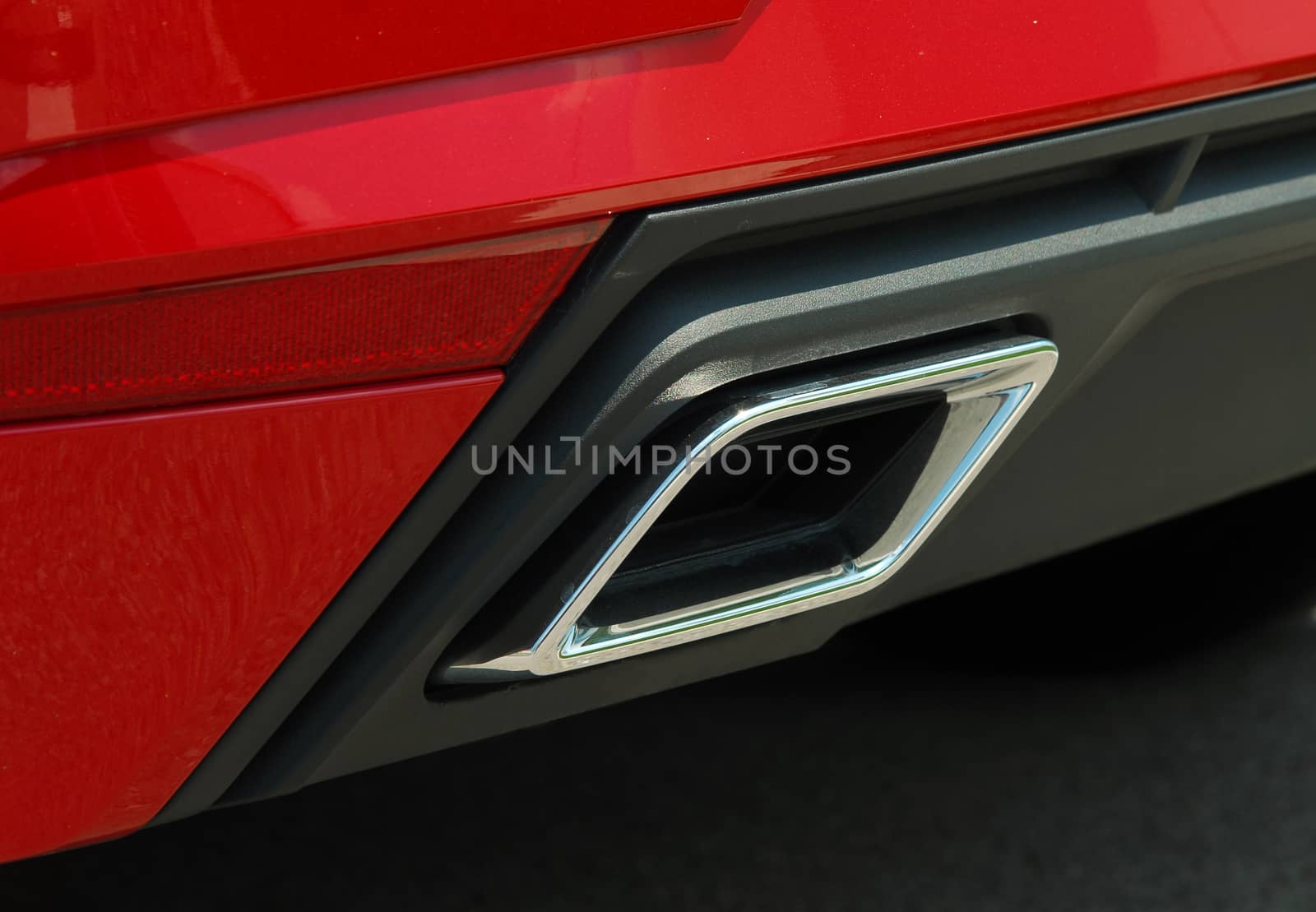 Close-up of Exhaust pipe on red sports car