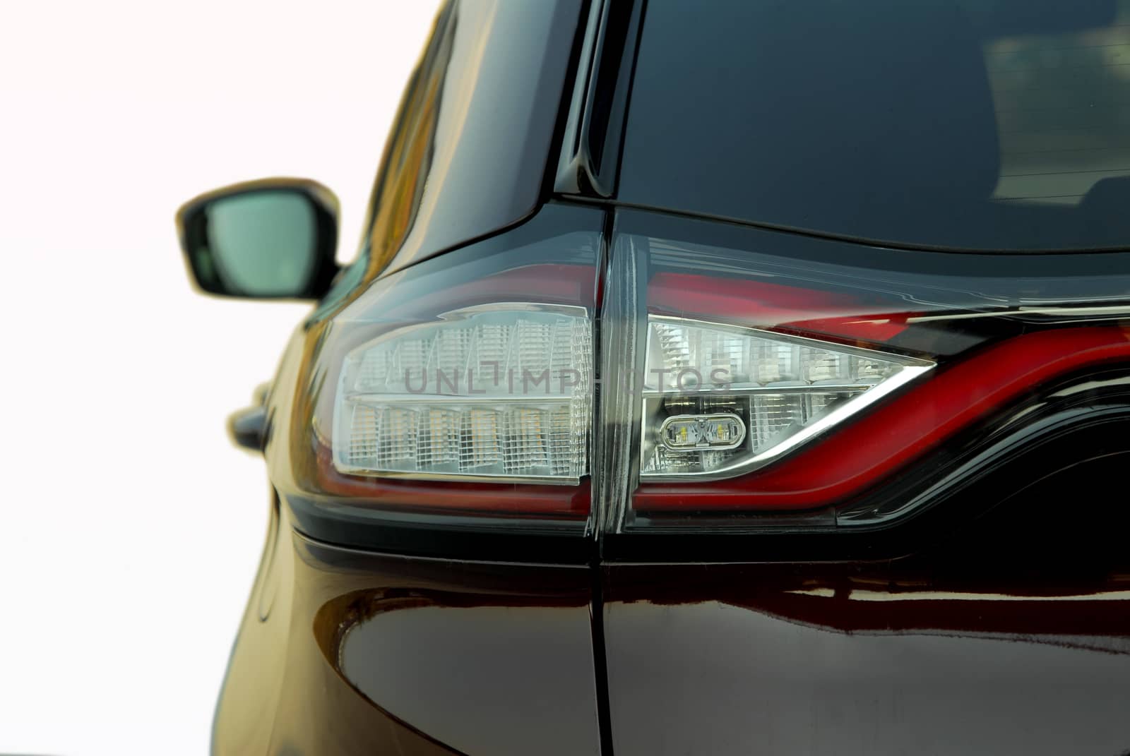 the tail lights on a luxury passenger car