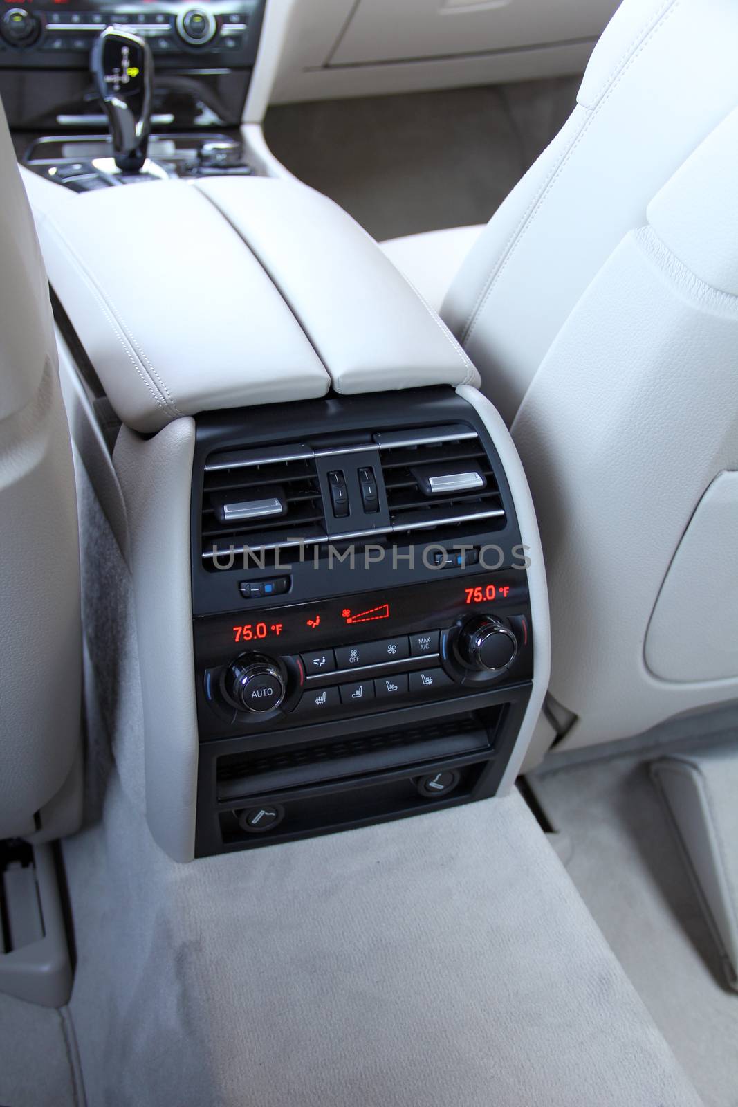 air conditioning controls in the rear seat rear seat in a luxury car by aselsa
