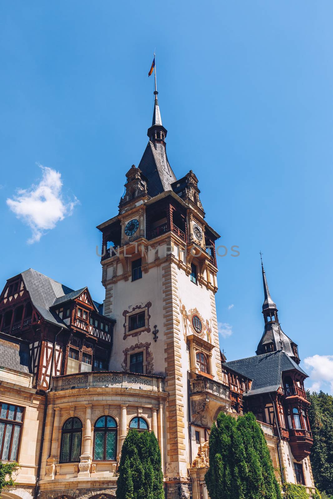 Peles Castle, Romania. Beautiful famous royal castle and ornamental garden in Sinaia landmark of Carpathian Mountains in Europe