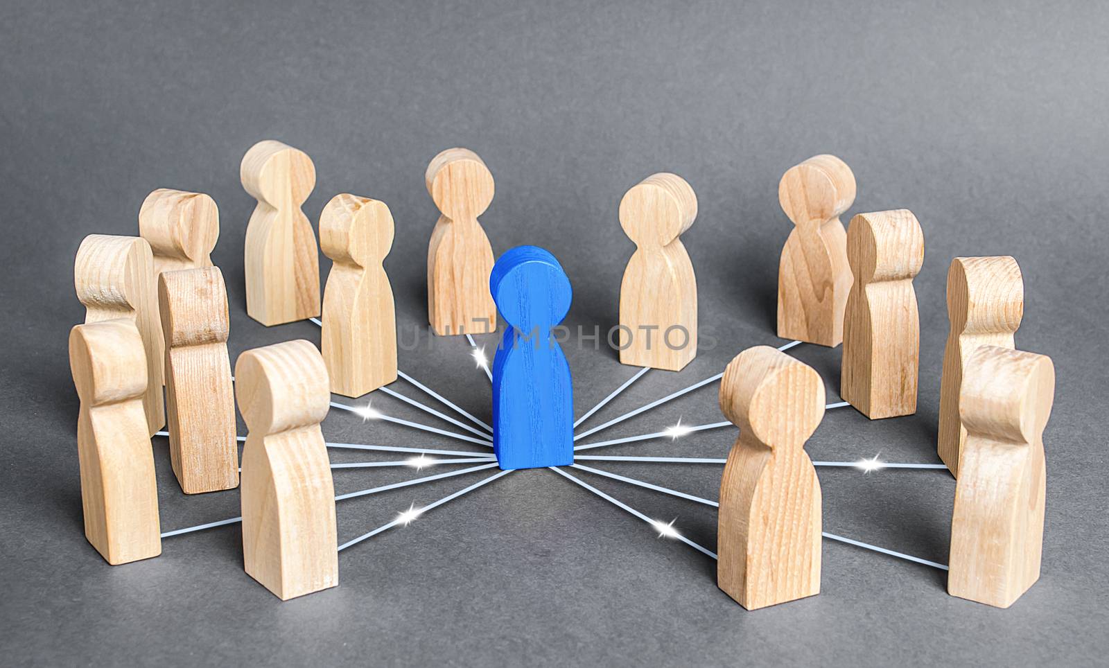 The blue person is connected with employees by wide network of lines. At the center of a complex large system. Communication social. Cooperation, collaboration. Project leadership personnel management