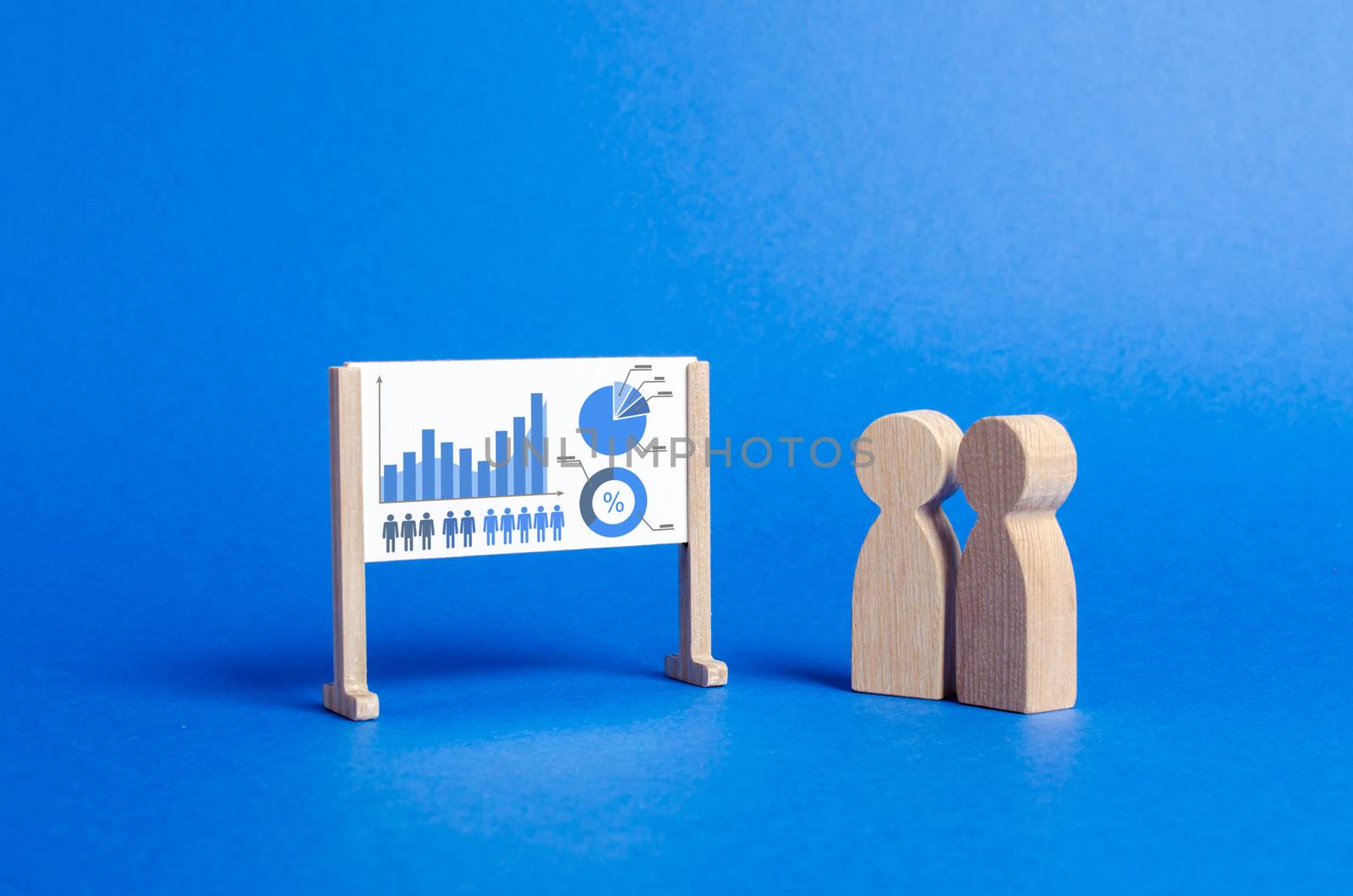 People stand at the whiteboard with graphs and data. Analytics and processing of financial data and economic indicators. Definition of business strategy and development. Business management by iLixe48