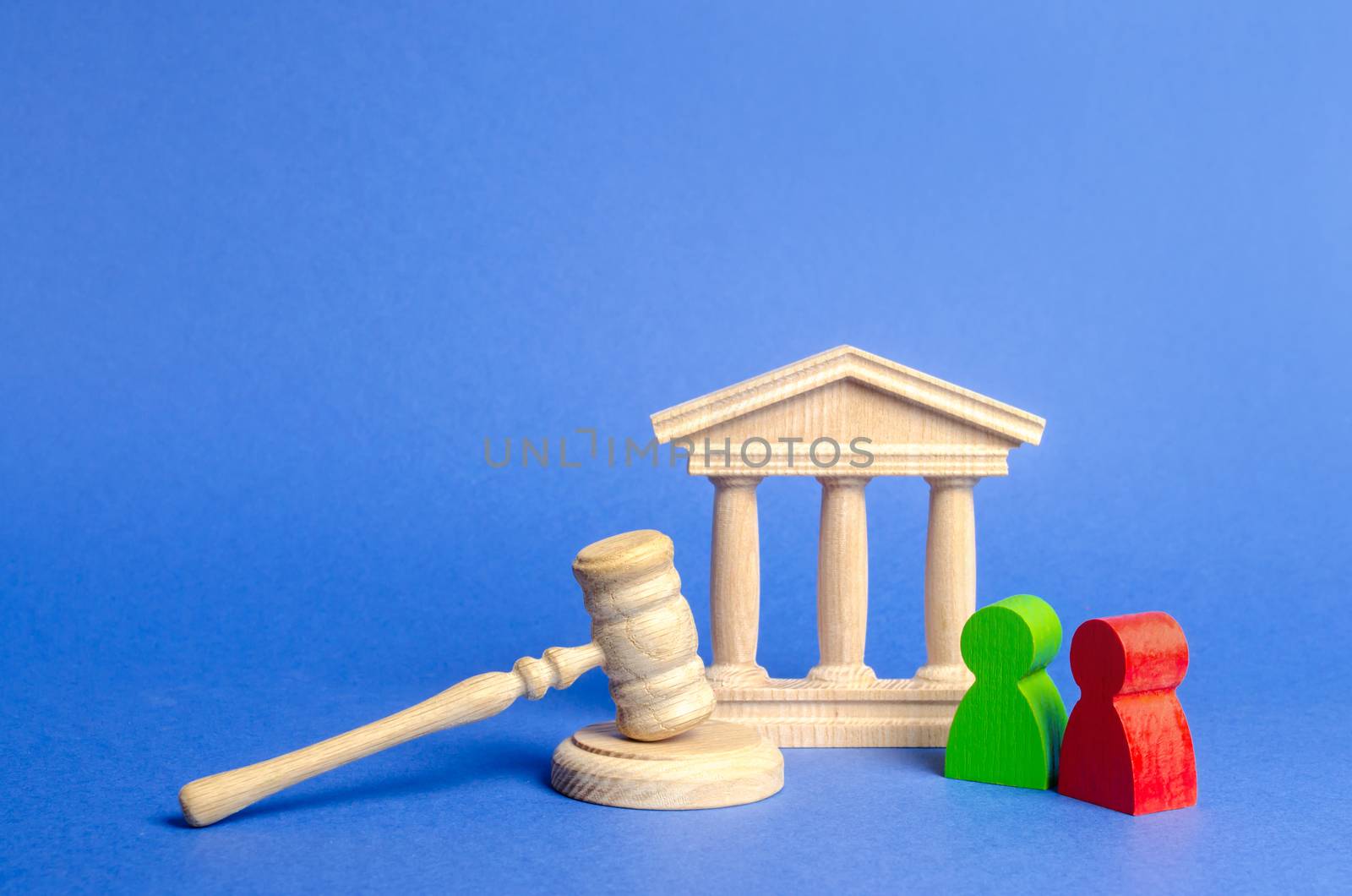 Two figures of people opponents stand near the courthouse and the judge's gavel. The judicial system. Conflict resolution in court, claimant and respondent. Court case, settling disputes. by iLixe48