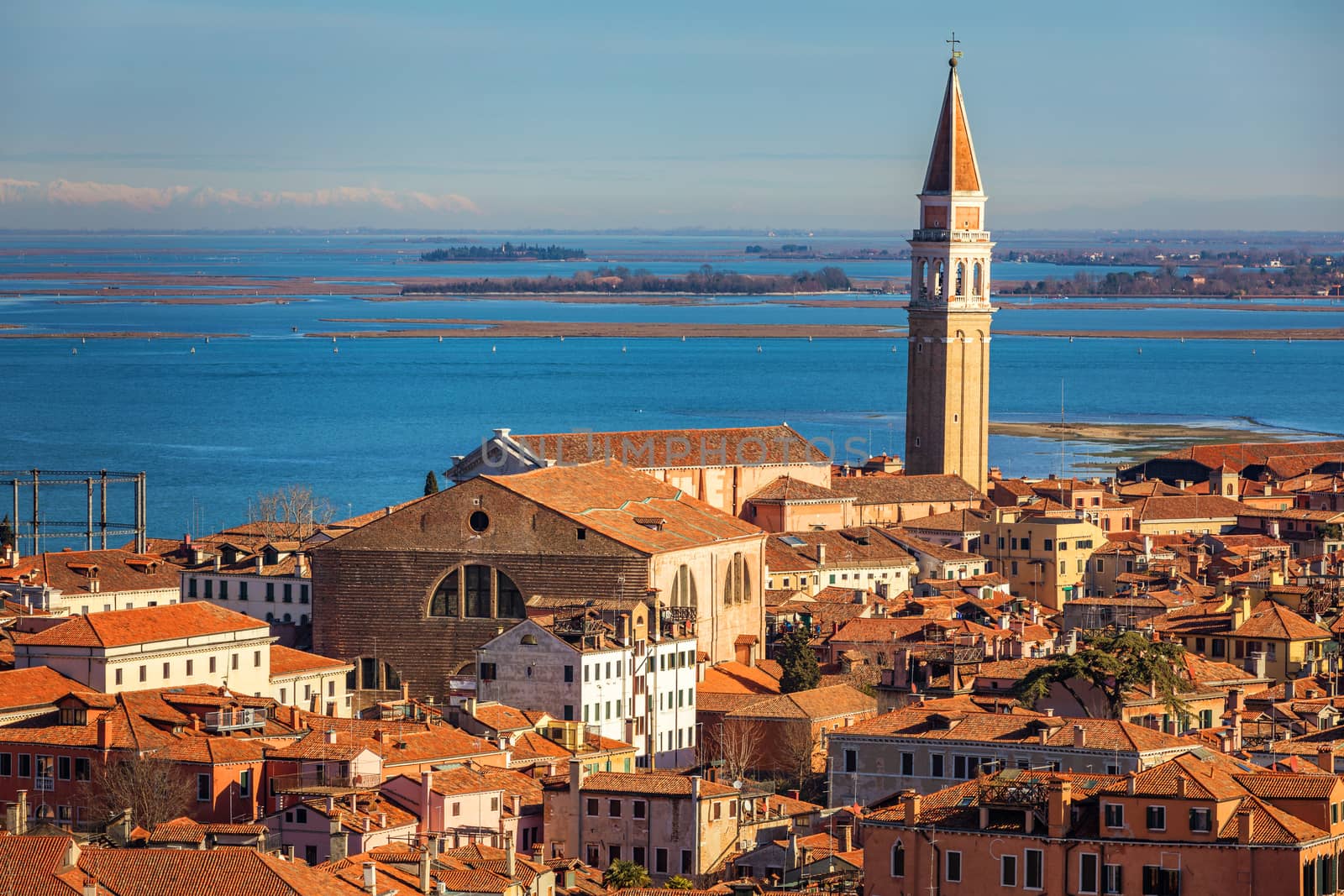 Venice panoramic aerial view with red roofs, Veneto, Italy. Aerial view of the Venice city, Italy. Venice is a popular tourist destination of Europe. Venice, Italy.