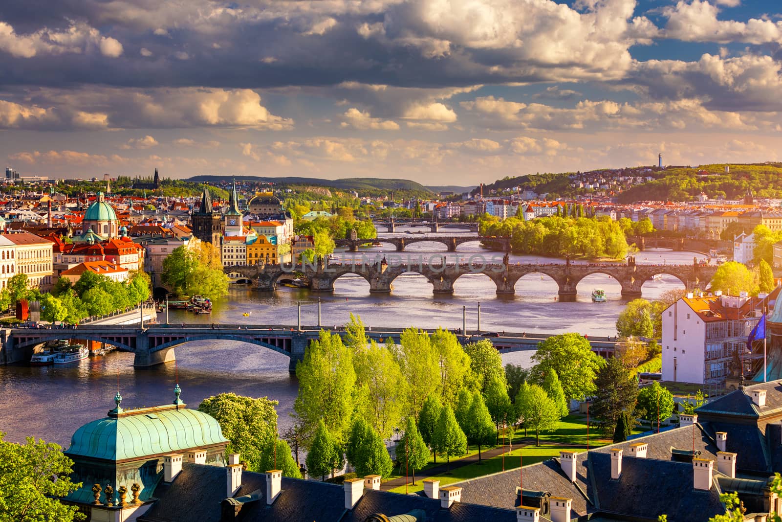 Scenic view on Vltava river and historical center of Prague, buildings and landmarks of old town, Prague, Czech Republic. Charles Bridge (Karluv Most) and Lesser Town Tower, Prague, Czechia