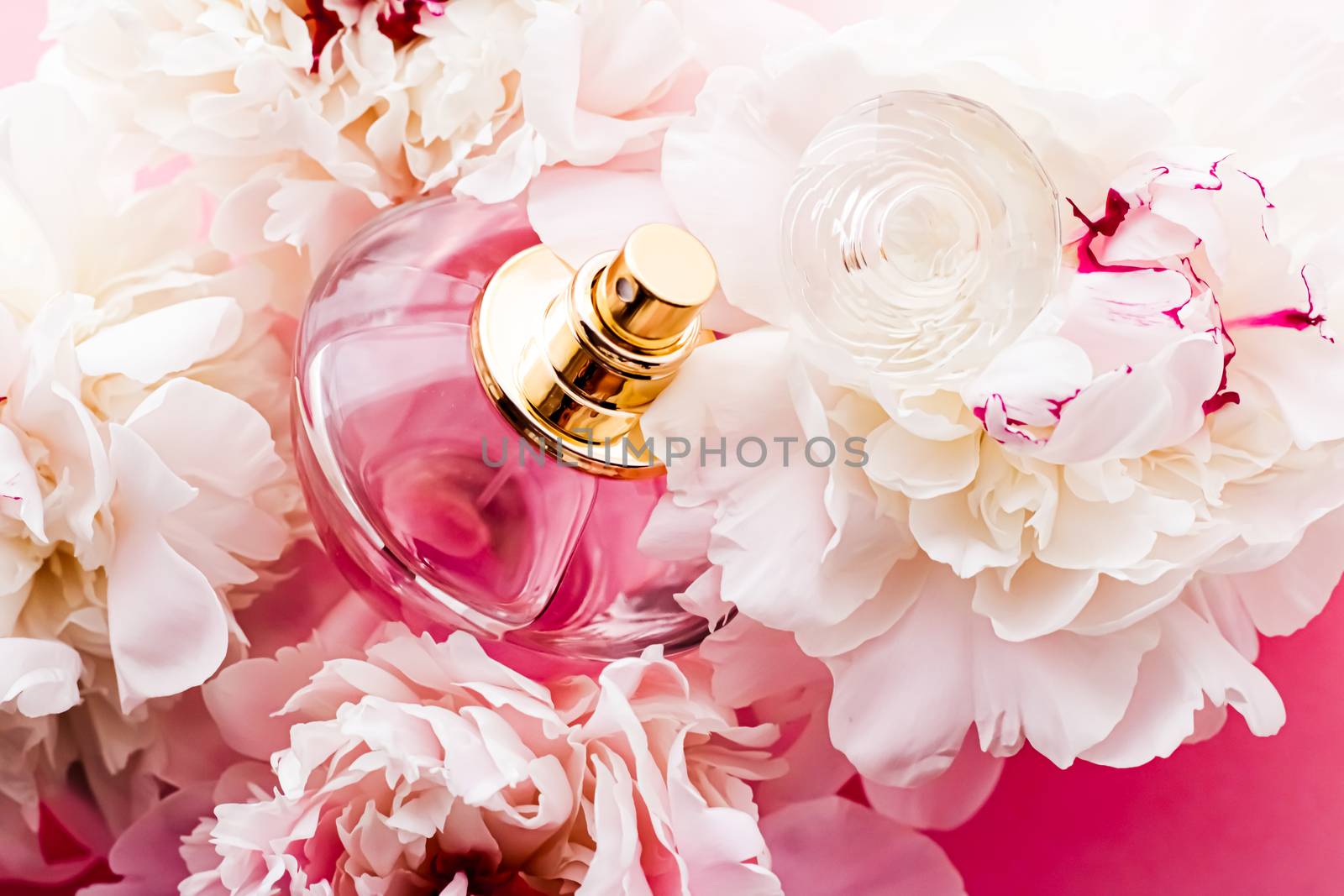 Luxurious fragrance bottle as chic perfume product on background of peony flowers, parfum ad and beauty branding by Anneleven