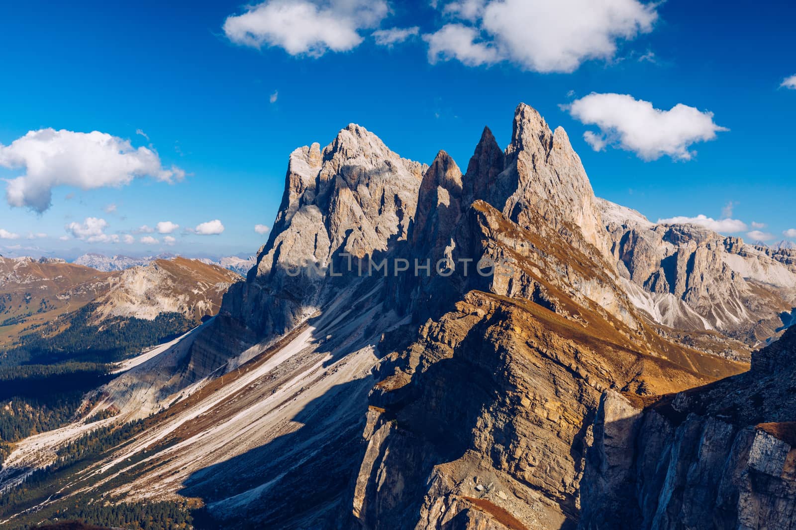 Seceda in autumn in South Tyrol in the Alps of North Italy. Views from Seceda over the Odle mountains in autumn with fall colors. Seceda, Val Gardena, Trentino Alto Adige, South Tyrol in Italy.