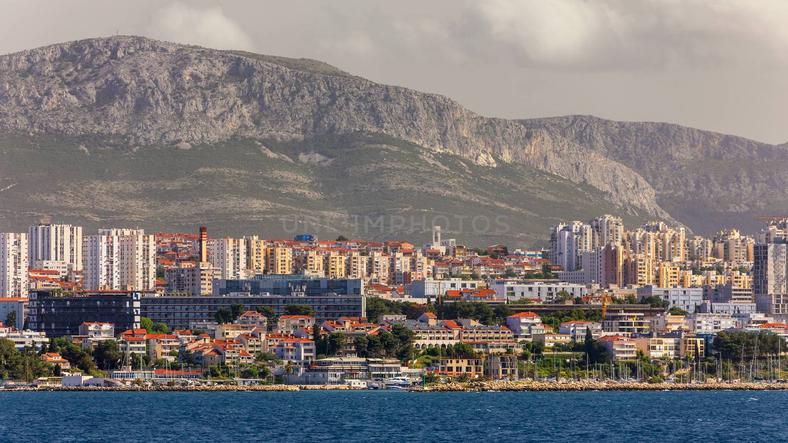 Split, Croatia (region of Dalmatia). UNESCO World Heritage Site. View of Split city, Diocletian Palace and Mosor mountains in background. Split panoramic view of town, Dalmatia, Croatia.