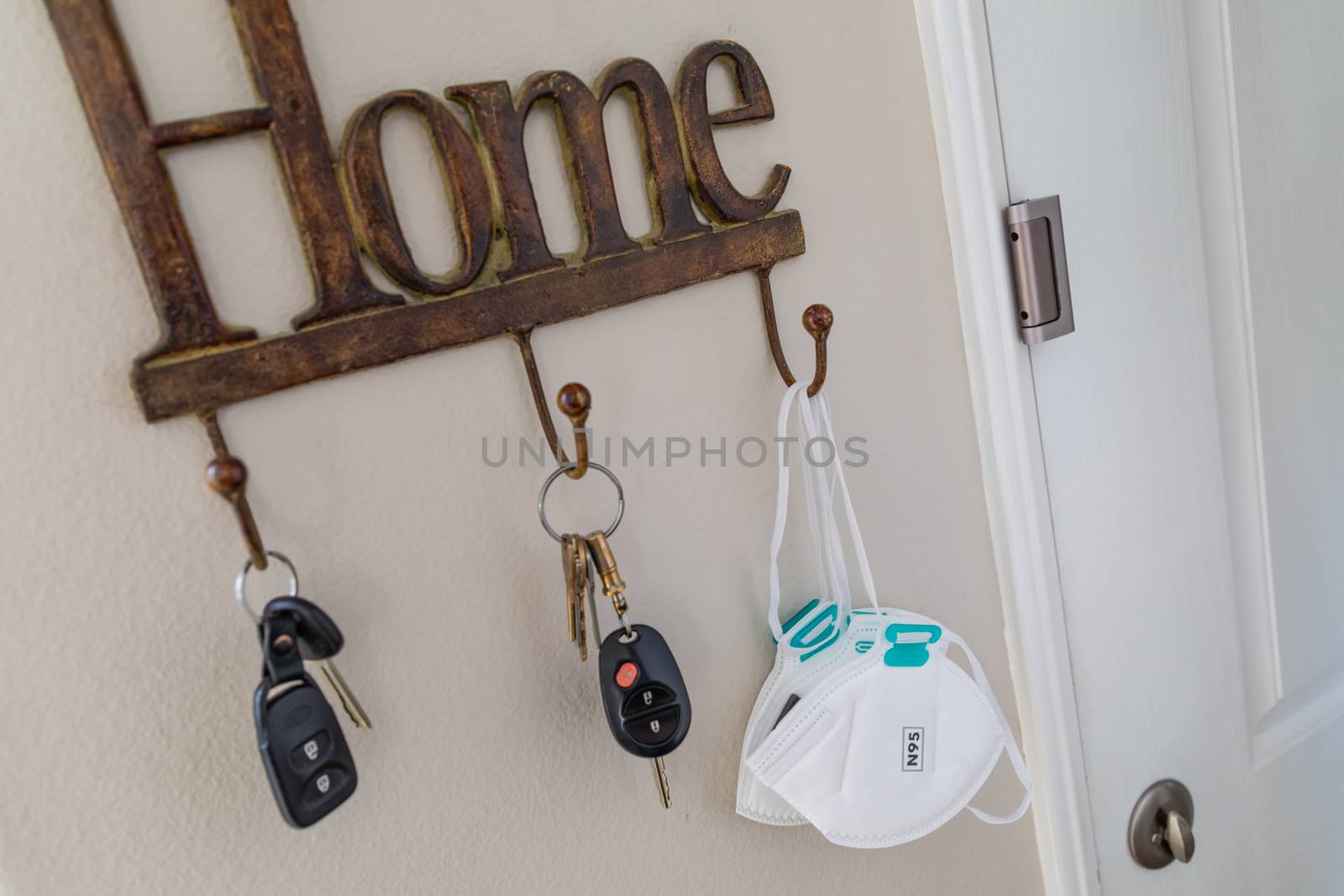 Home Key Hanger Rack Next to Door With Keys and Medical Face Mas by Feverpitched