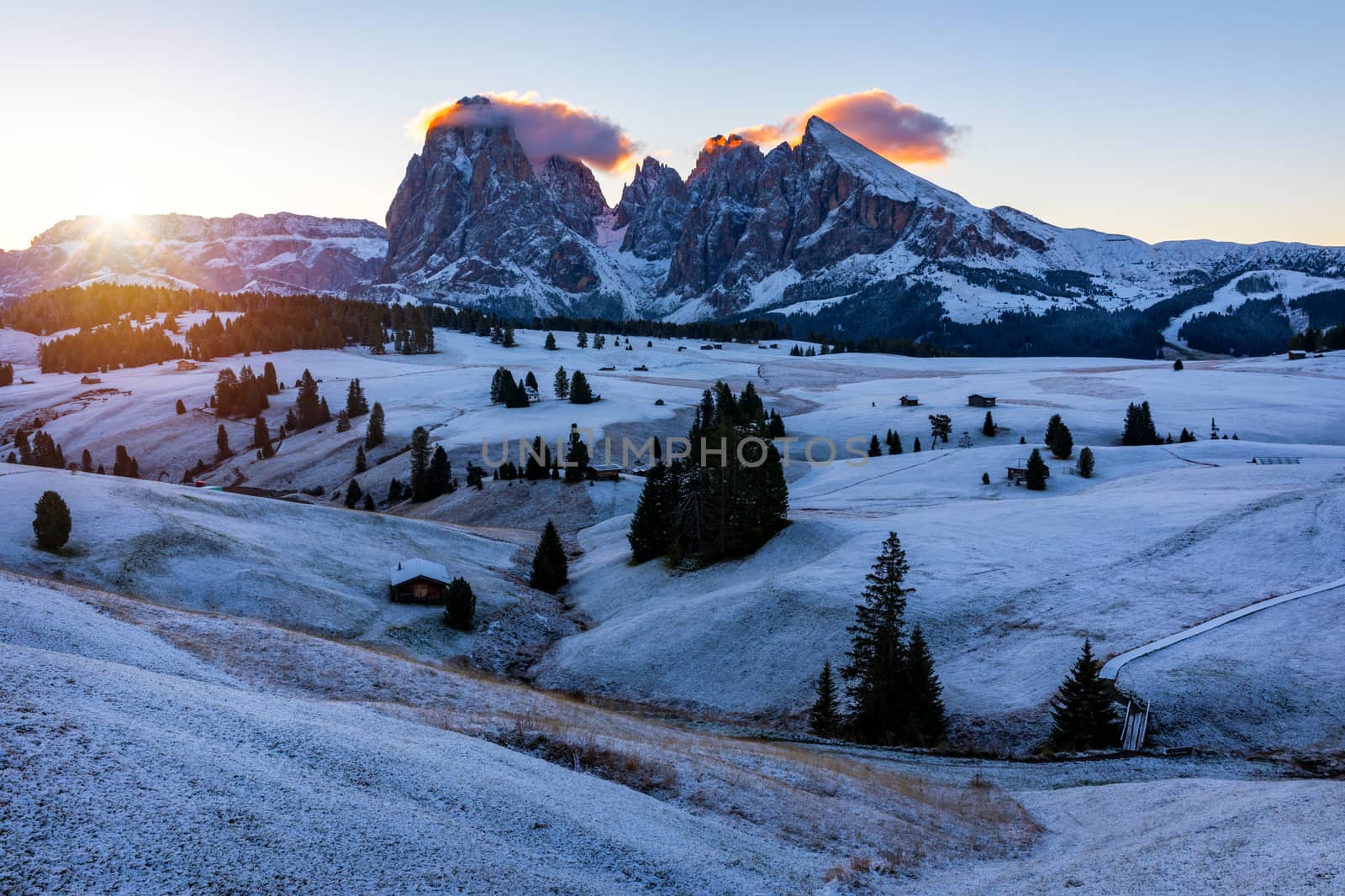 Alpe di Siusi or Seiser Alm with Sassolungo, Langkofel mountain group in background. Alpe di Siusi or Seiser Alm, Sassolungo and Sassopiatto mountains, Trentino Alto Adige, Sud Tyrol, Italy, Europe.