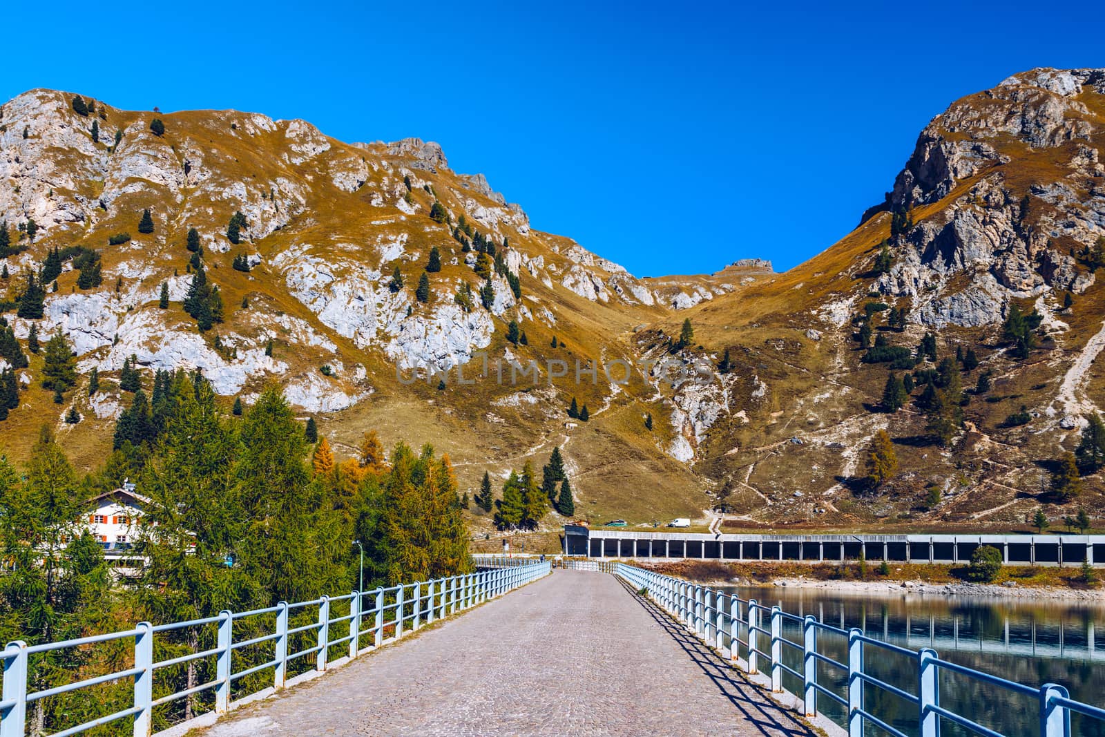 Lago Fedaia (Fedaia Lake), Fassa Valley, Trentino Alto Adige, an artificial lake and a dam near Canazei city, located at the foot of Marmolada massif. Fedaia Lake is the Province of Belluno, Italy.