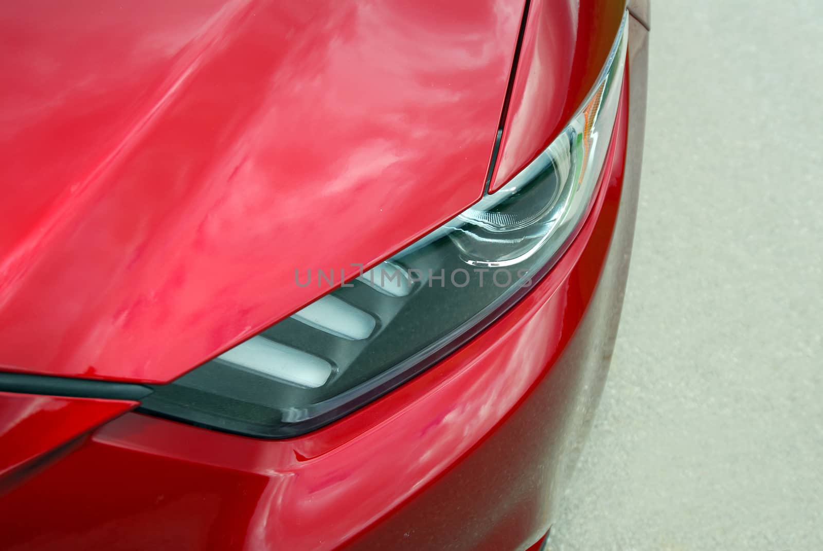 Close up shot of sports car head lamp