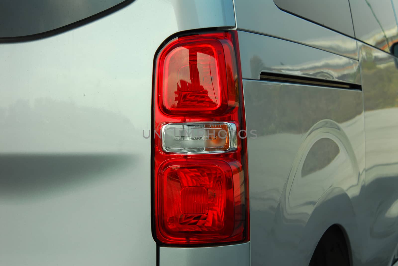 the tail lights on a luxury passenger car