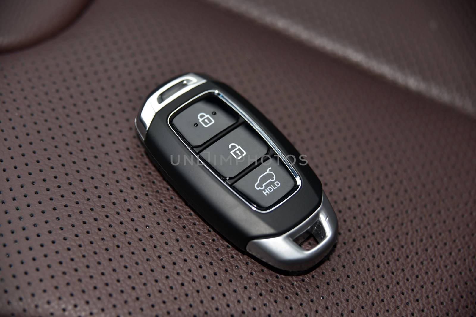 pop-up car key with remote central locking on white background