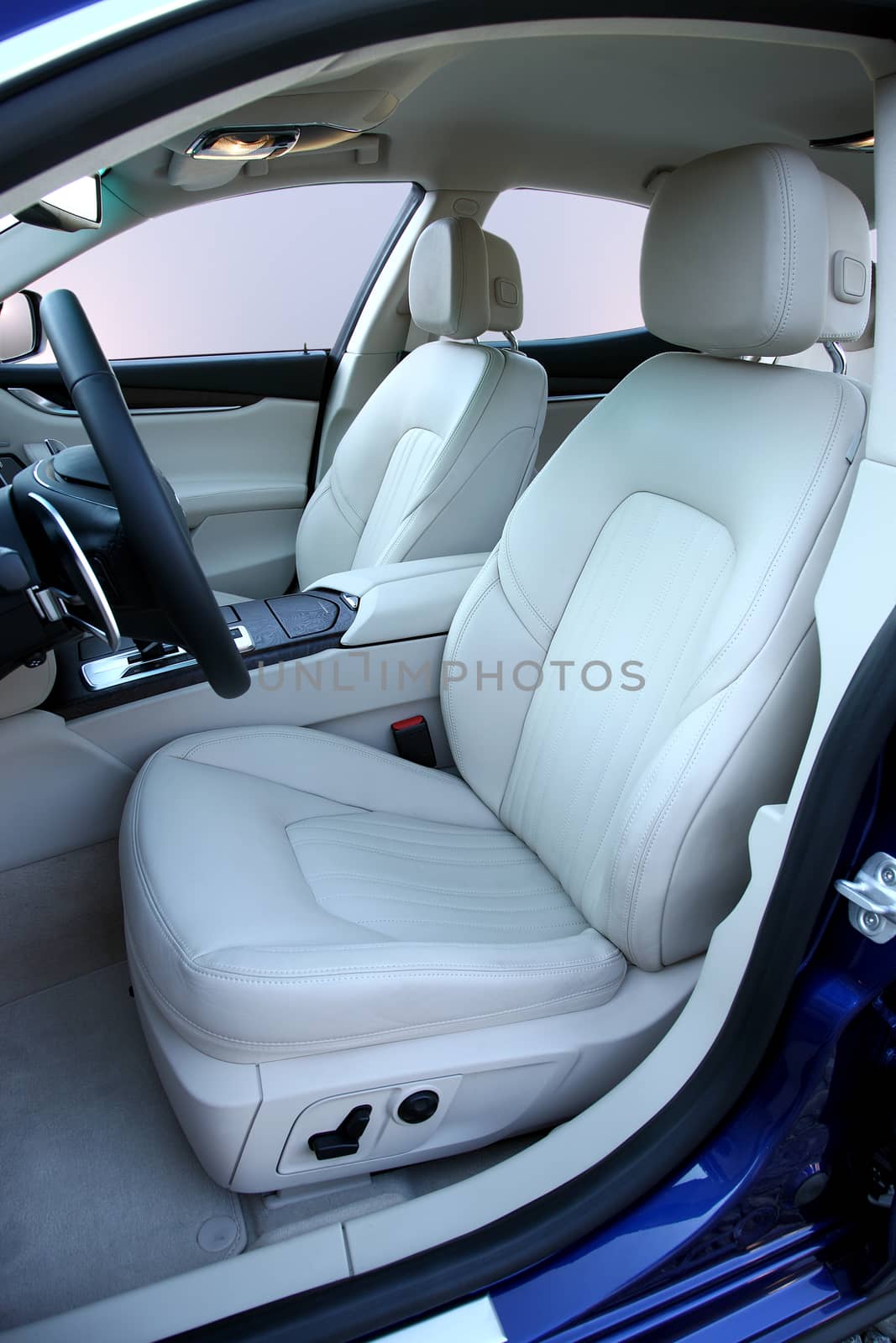 white front seats in a large passenger car by aselsa