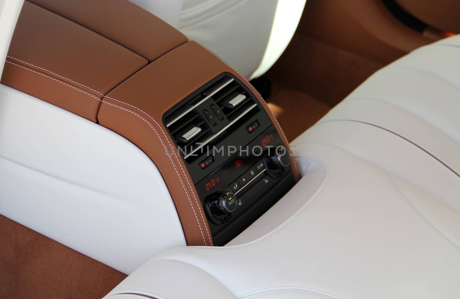 air conditioning controls in the rear seat rear seat in a luxury car