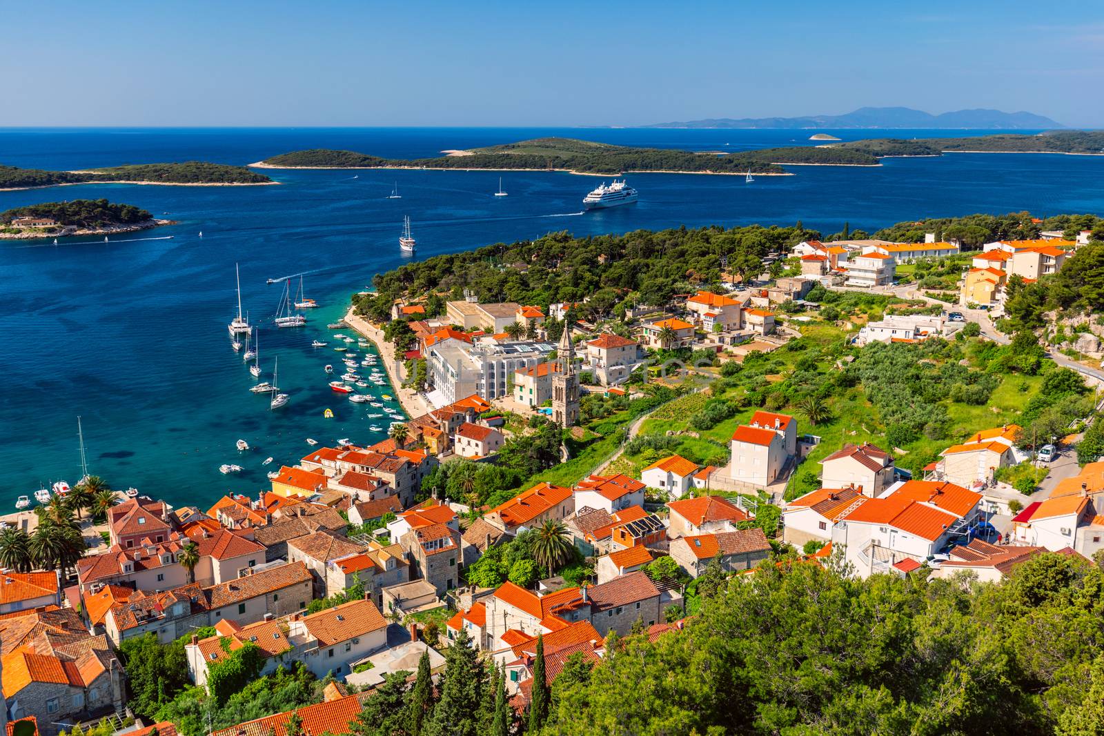 View at amazing archipelago in front of town Hvar, Croatia. Harbor of old Adriatic island town Hvar. Popular touristic destination of Croatia. Amazing Hvar city on Hvar island, Croatia.