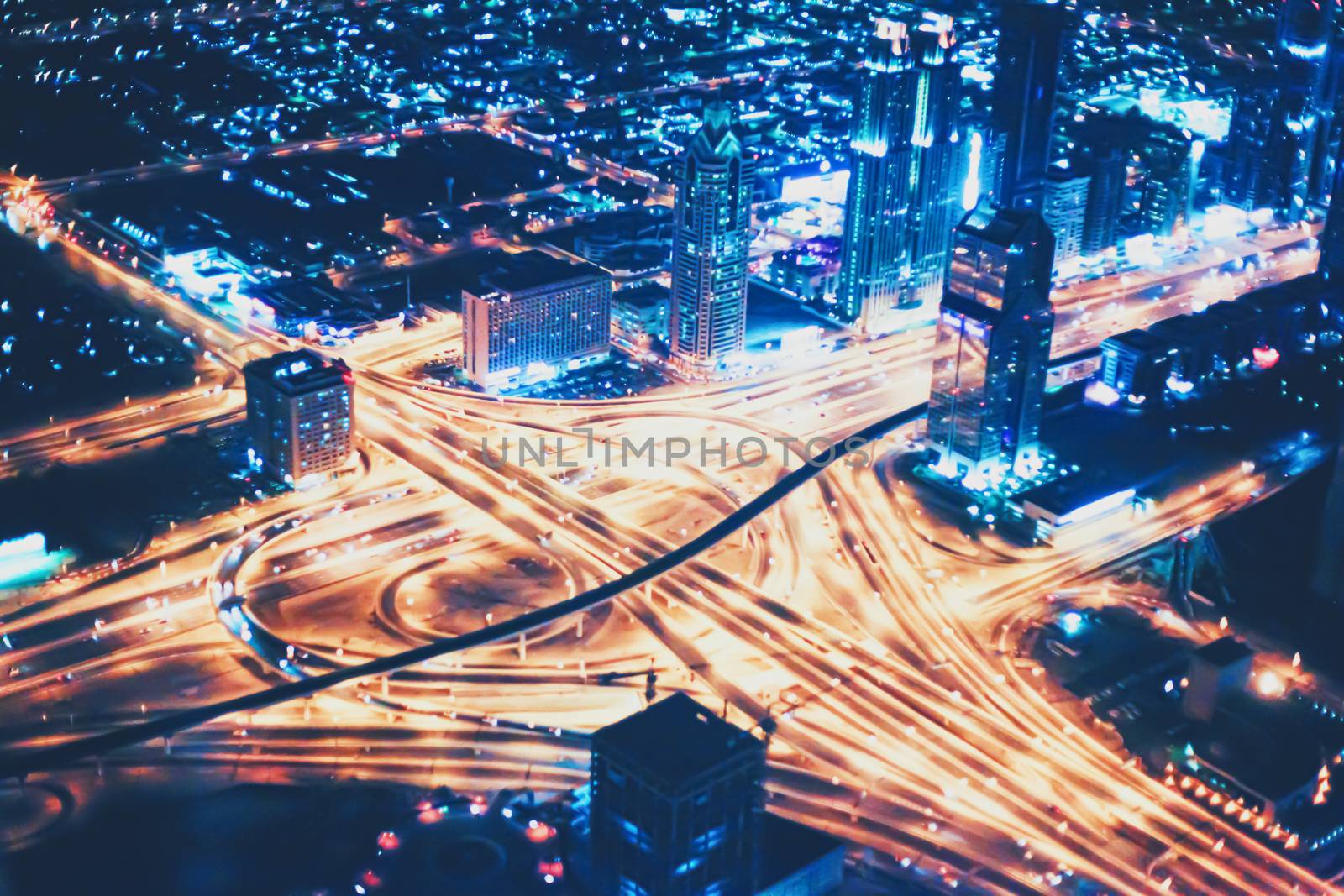 Aerial night view of Dubai in United Arab Emirates, metropolitan cityscape scenery