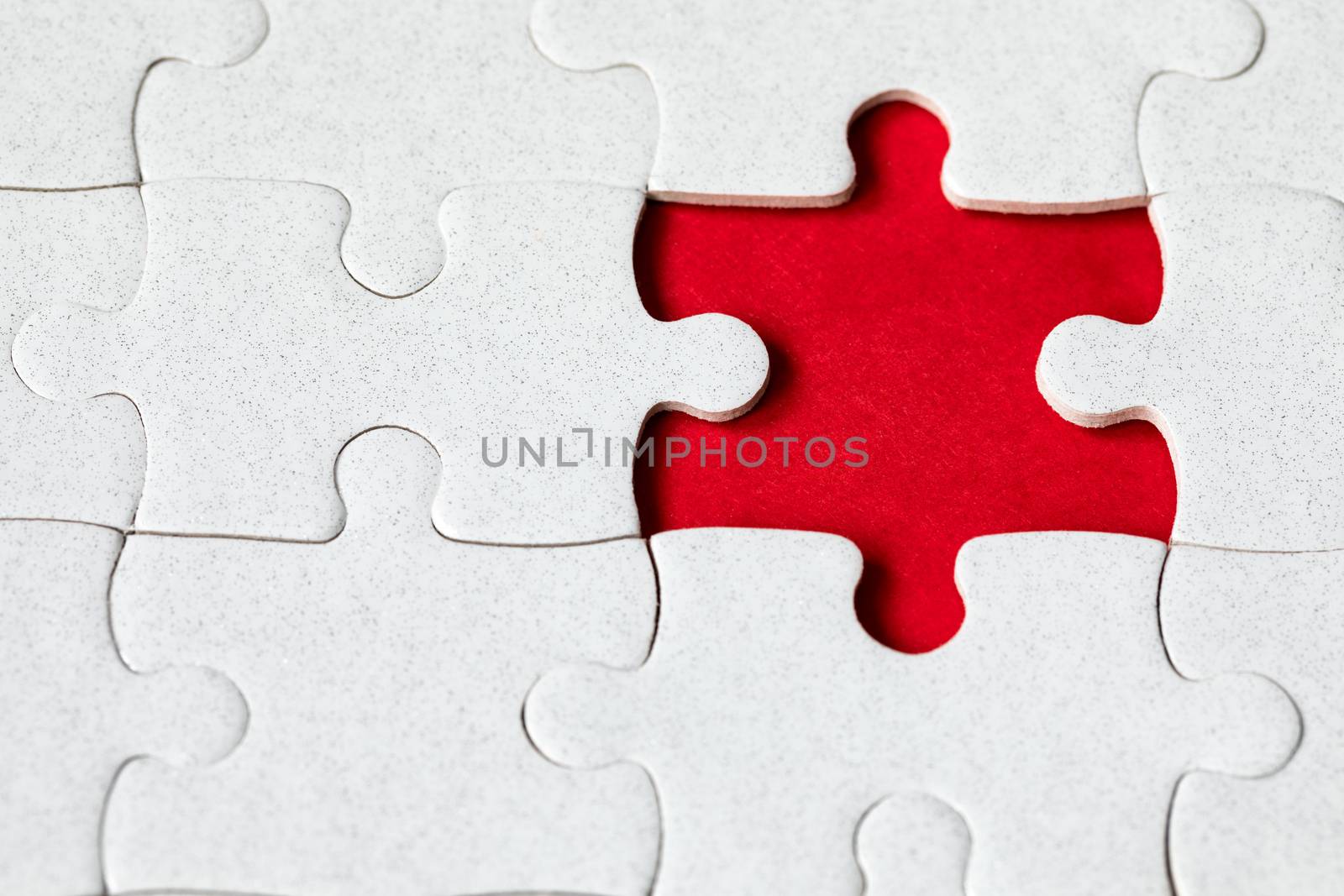 Jigsaw puzzle with missing piece. Missing puzzle pieces. Concept image of unfinished task. Completing final task, missing jigsaw puzzle pieces and business concept with a puzzle piece missing.