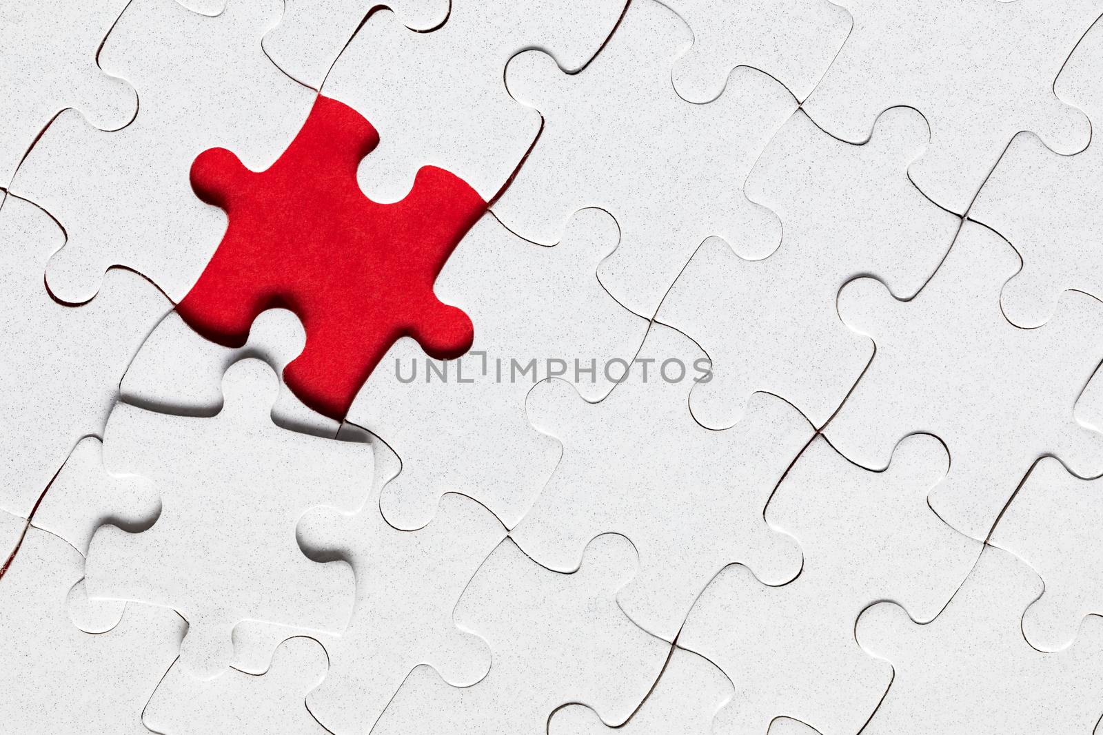 Jigsaw puzzle with missing piece. Missing puzzle pieces. Concept image of unfinished task. Completing final task, missing jigsaw puzzle pieces and business concept with a puzzle piece missing.