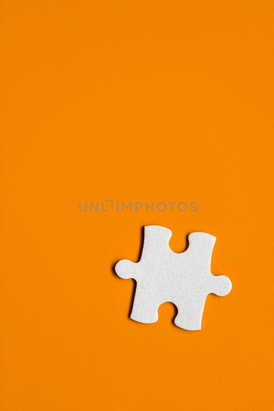 Closeup of jigsaw puzzle isolated. Missing jigsaw puzzle piece, business concept for completing the puzzle piece. Group of puzzle and a puzzle piece. Teamwork concept. Think difference concept. 