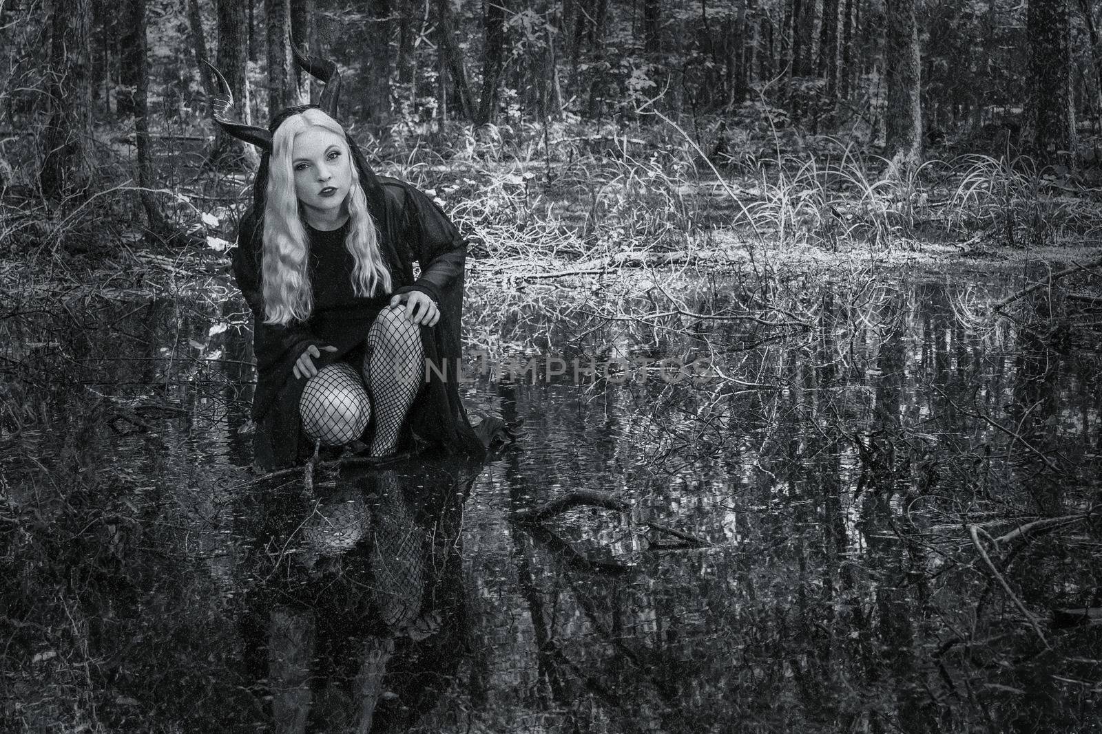 A Lovely Gothic Model Acts In A Forest Environment by actionsports