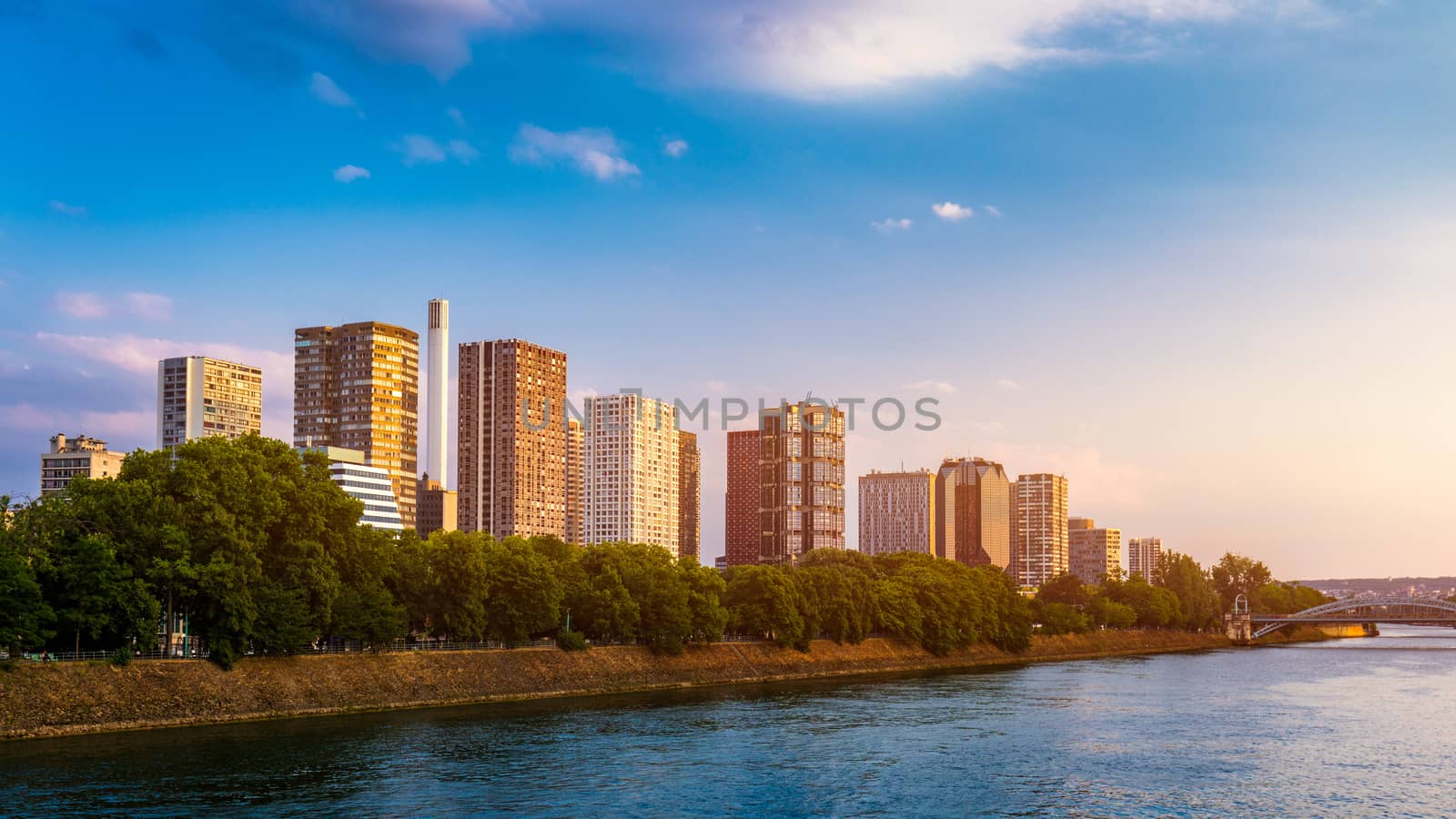 Towers, skyscrapers and buildings of the Front-de-Seine by the River Seine, seen from the bridge Pont de Grenelle. Paris, France.