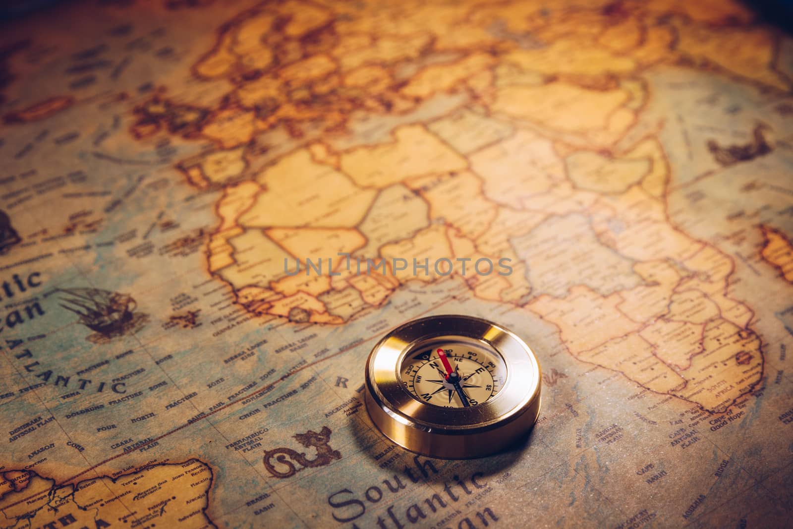 Map with compass. Simple navigation tools to orient in the world. The map used for background is in Public domain. Map source: Library of Congress. Country: Belgium Year: 1570. Author: Abraham Ortelius (1527-1598)