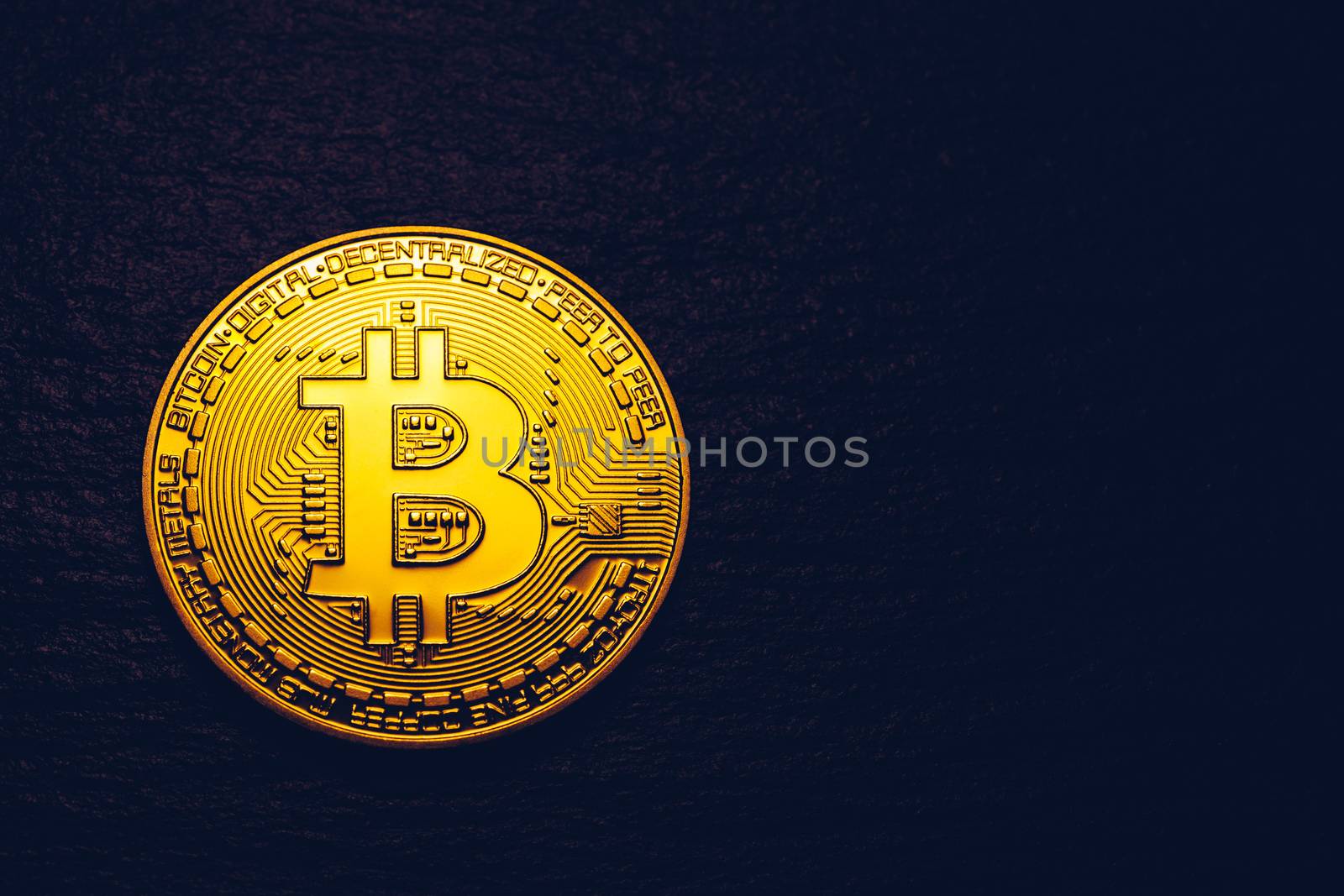 Crypto currency golden coin with bitcoin symbol on isolated on black background. Bitcoin Coin on black background. Bitcoin cryptocurrency.  Cryptocurrency Coin Concept.
