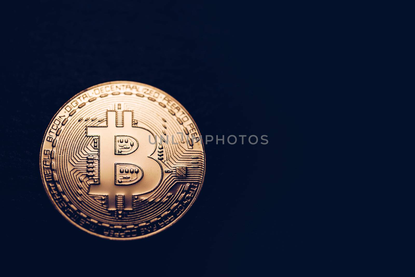 Crypto currency golden coin with bitcoin symbol on isolated on black background. Bitcoin Coin on black background. Bitcoin cryptocurrency.  Cryptocurrency Coin Concept.