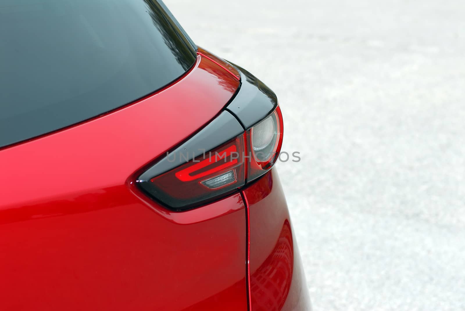 the tail lights on a luxury passenger car