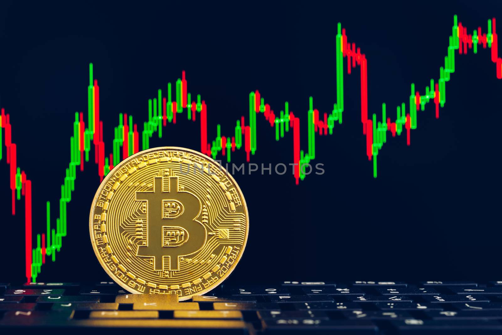 Bitcoin gold coin and defocused chart background. Virtual cryptocurrency concept. Bitcoins on ladder chart cryptocurrency concept. Bitcoin currency with blockchain concept.