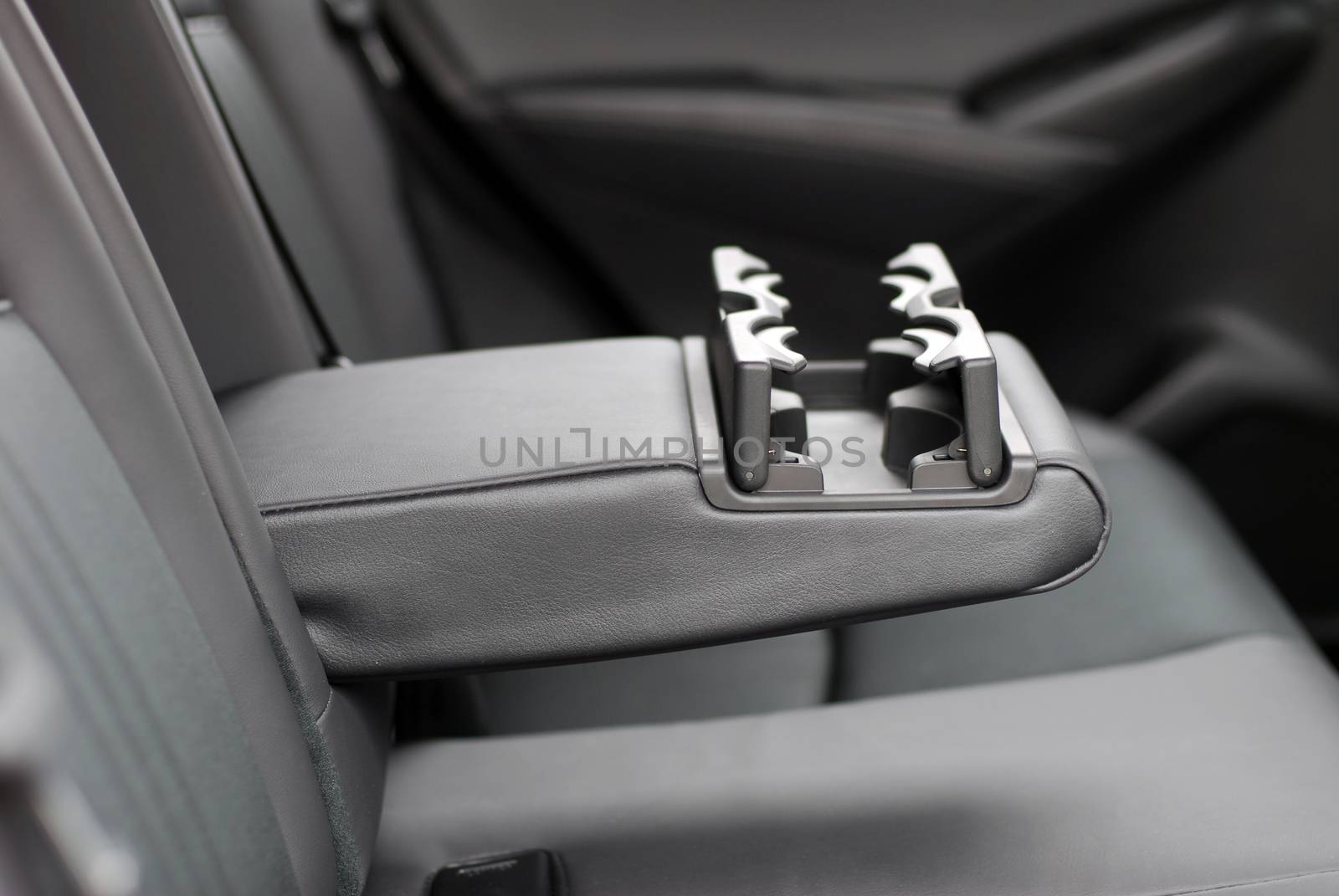 armrest in the car with can holders, rear seats by aselsa