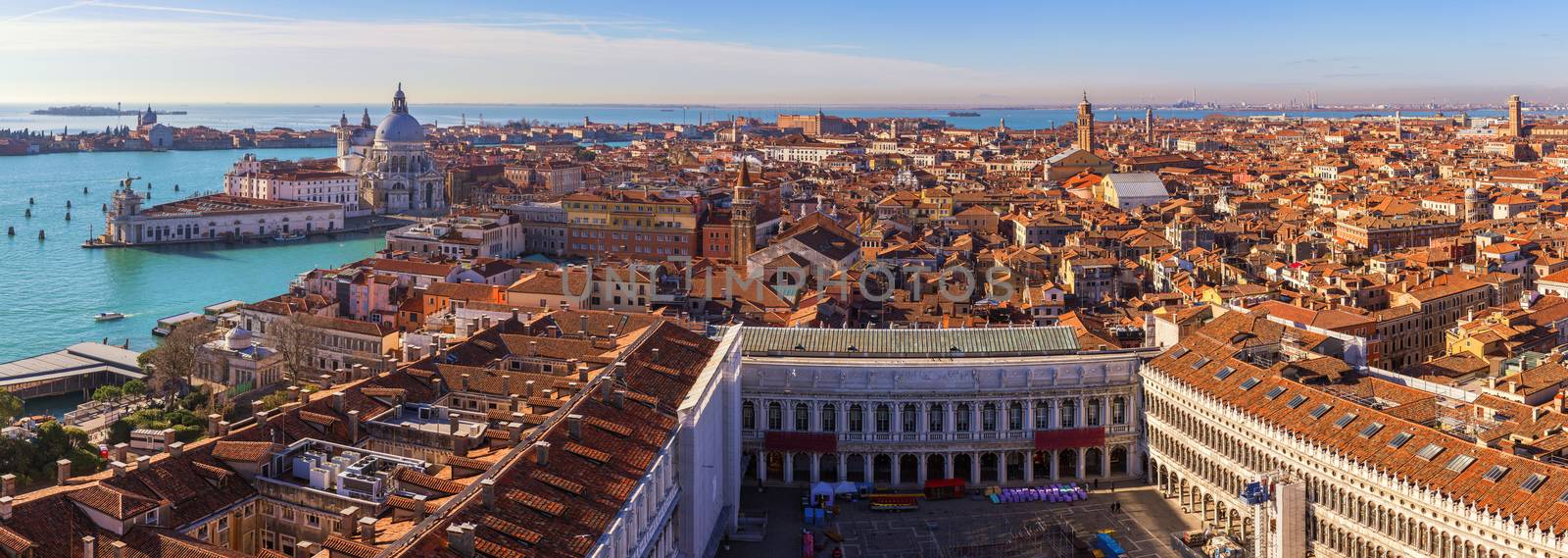 Venice panoramic aerial view with red roofs, Veneto, Italy. Aerial view with dense medieval red roofs of Venice, Italy 