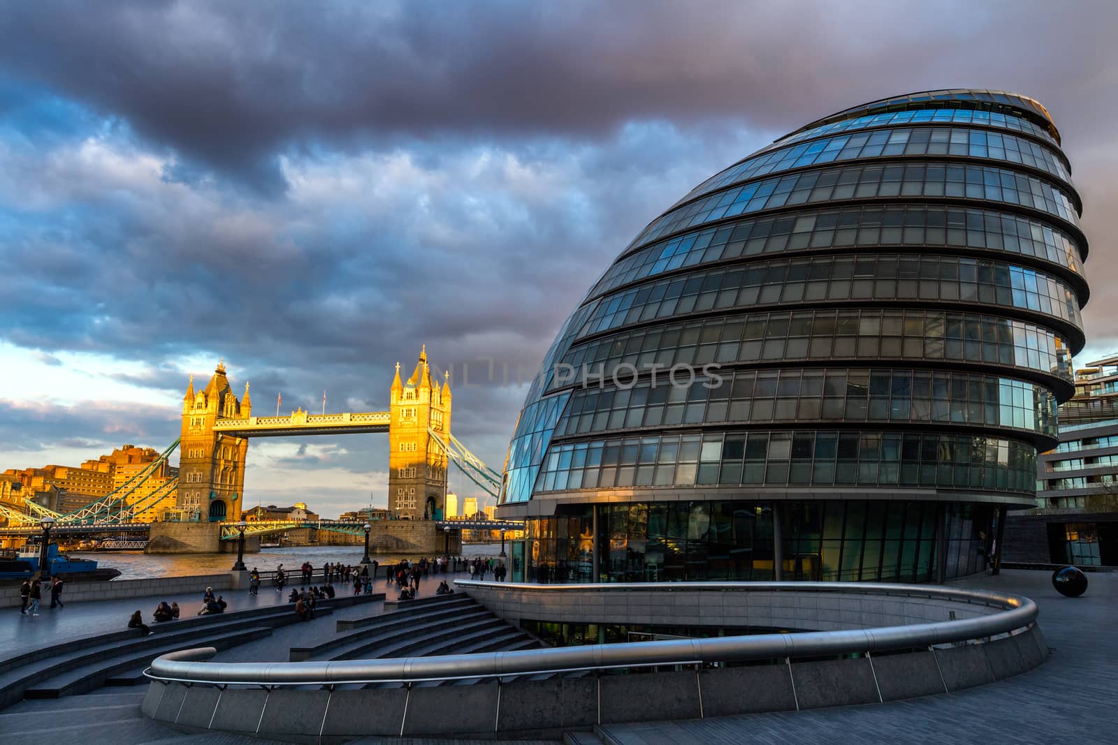London skyline with City Hall and Tower Bridge at sunset, London, UK