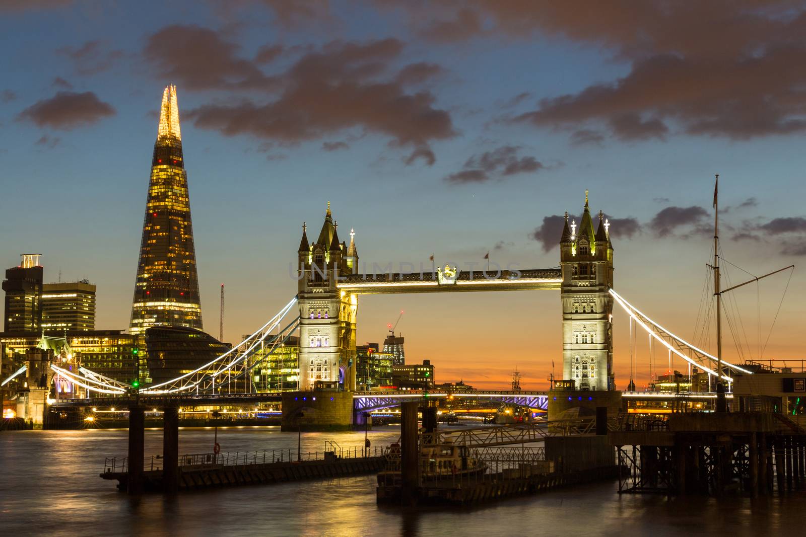 Magnificent view of Tower Bridge, the Shard and the River Thames at night, London, Uk.