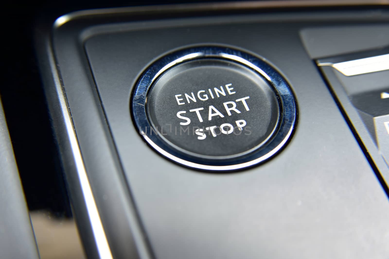 Start stop engine button on a modern car dashboard