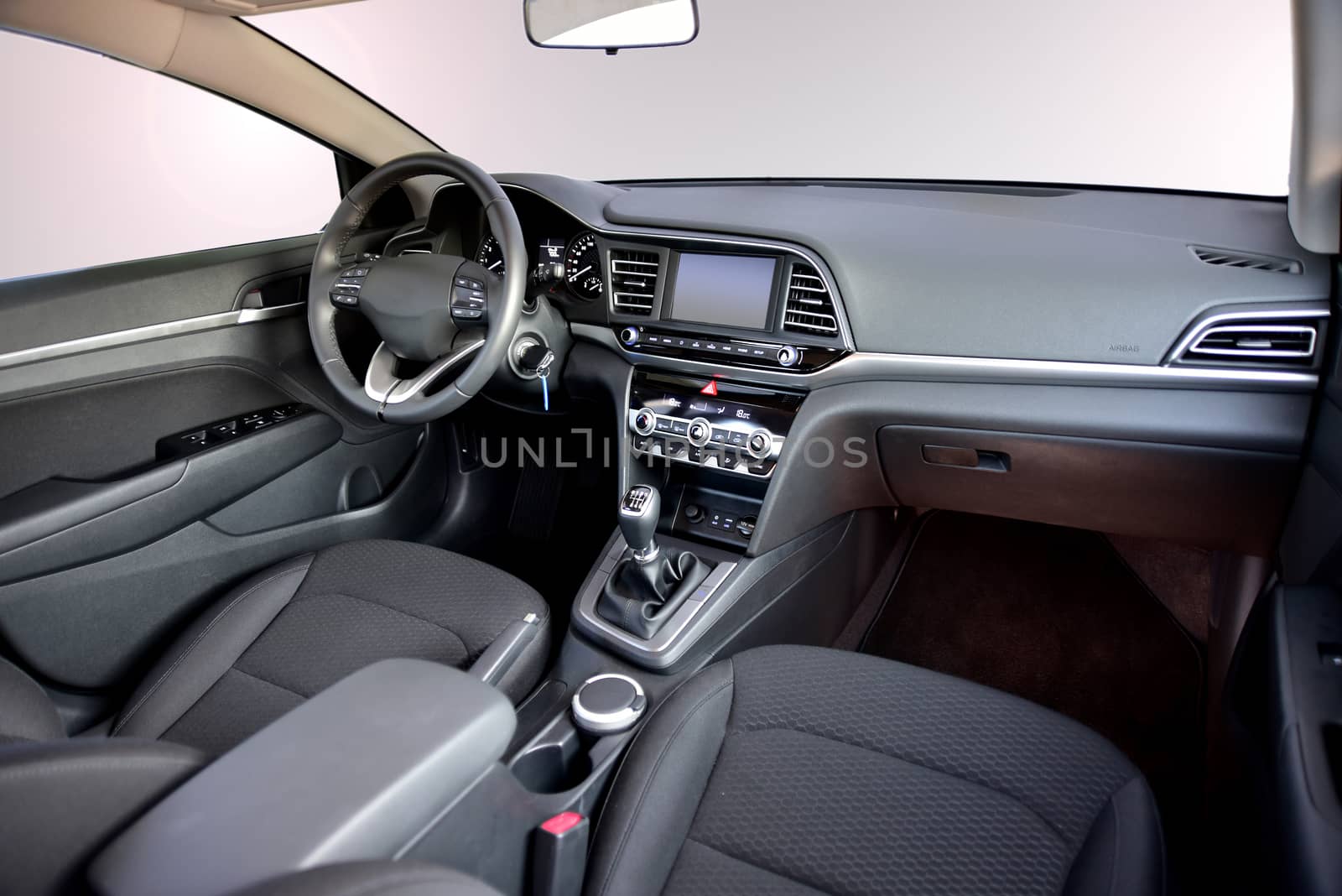 studio shot passenger car interior, front view